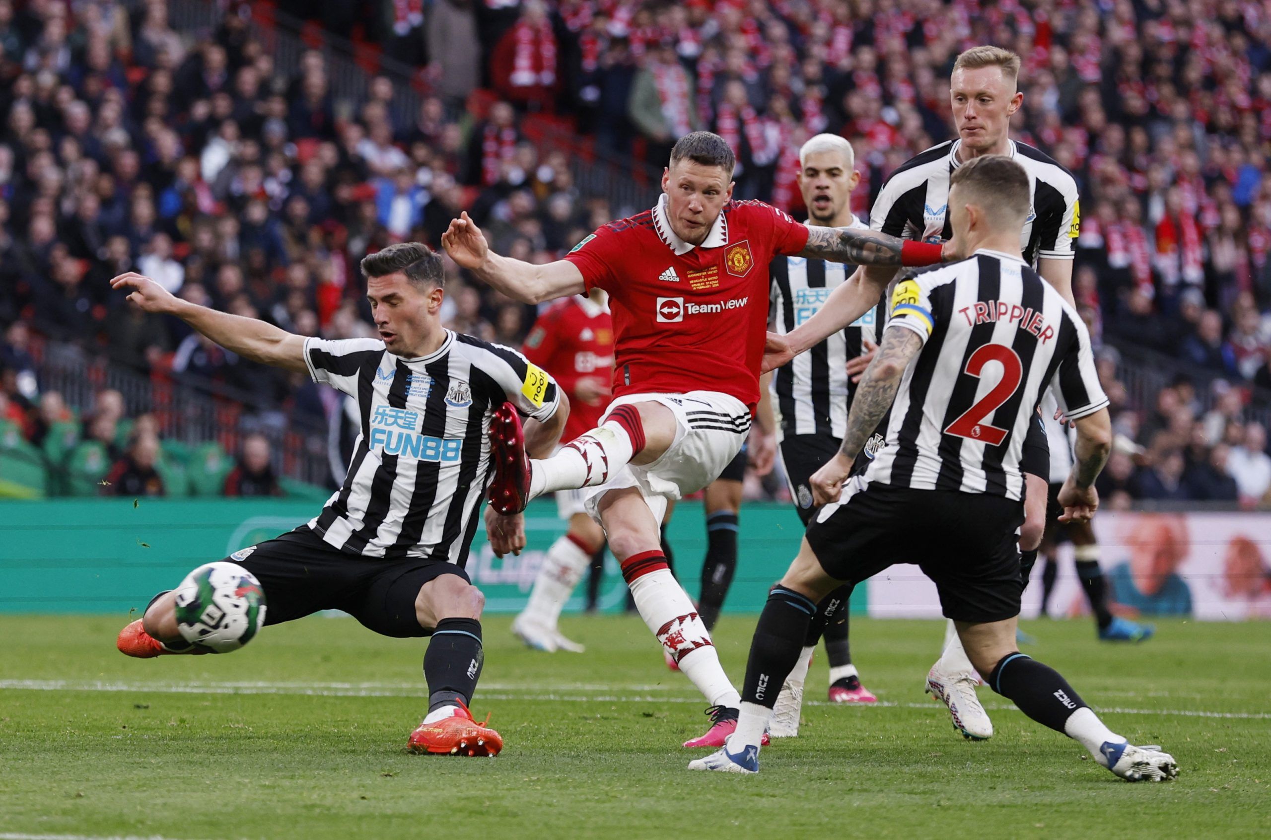 Soccer Football - Carabao Cup - Final - Manchester United v Newcastle United - Wembley Stadium, London, Britain - February 26, 2023  Newcastle United's Fabian Schar in action as Manchester United's Wout Weghorst shoots at goal Action Images via Reuters/Andrew Couldridge EDITORIAL USE ONLY. No use with unauthorized audio, video, data, fixture lists, club/league logos or 'live' services. Online in-match use limited to 75 images, no video emulation. No use in betting, games or single club /league/p