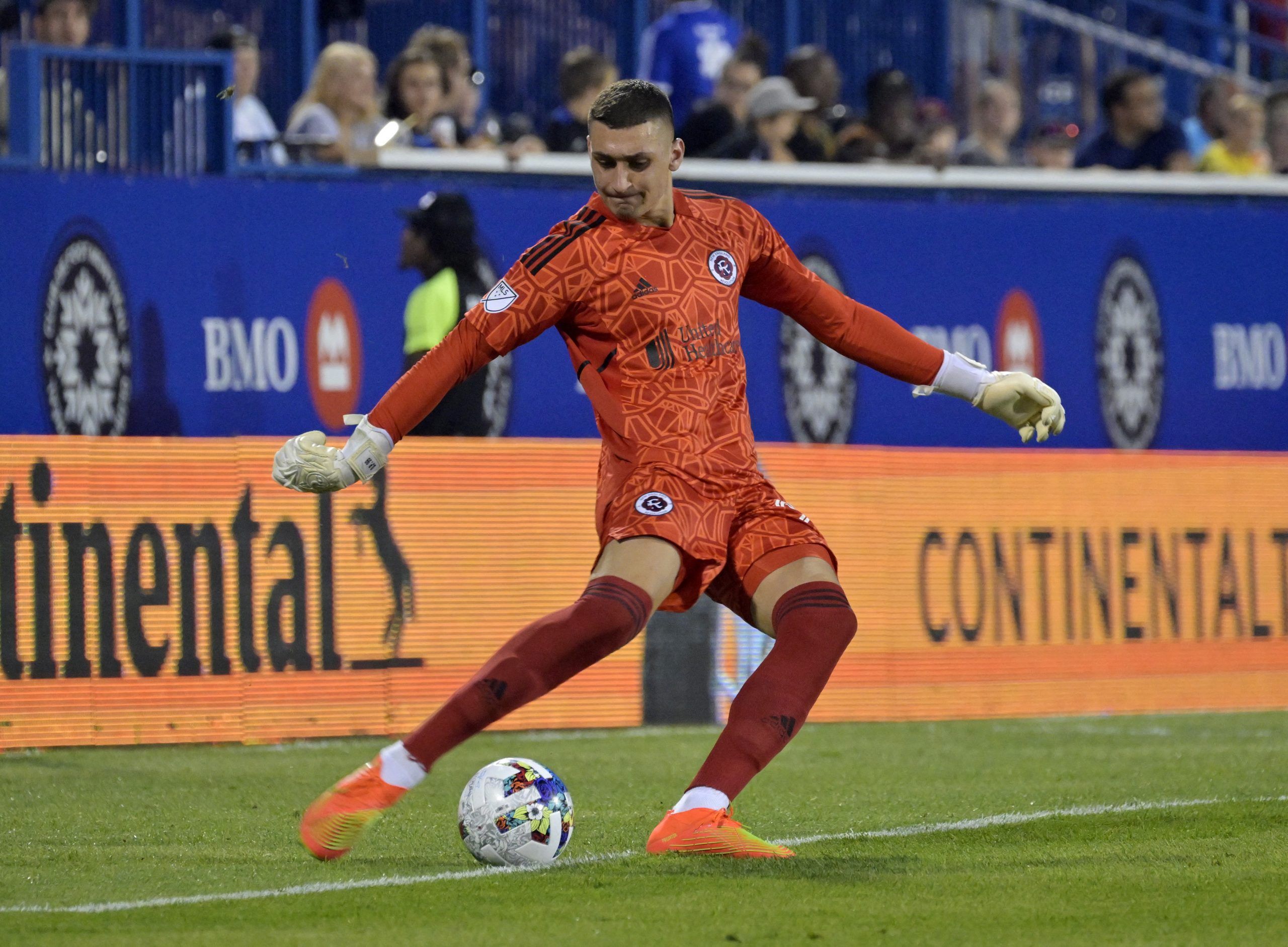 Aug 20, 2022; Montreal, Quebec, CAN; New England Revolution goalkeeper Djordje Petrovic (99) kicks the ball against CF Montreal during the first half at Stade Saputo. Mandatory Credit: Eric Bolte-USA TODAY Sports