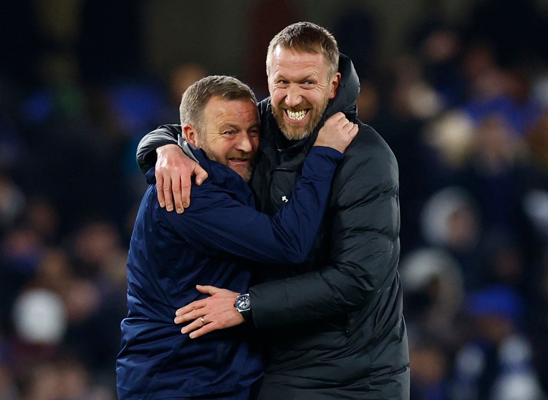 Soccer Football - Champions League - Round of 16 - Second Leg - Chelsea v Borussia Dortmund - Stamford Bridge, London, Britain - March 7, 2023 Chelsea manager Graham Potter and assistant manager Billy Reid celebrate after the match Action Images via Reuters/Peter Cziborra