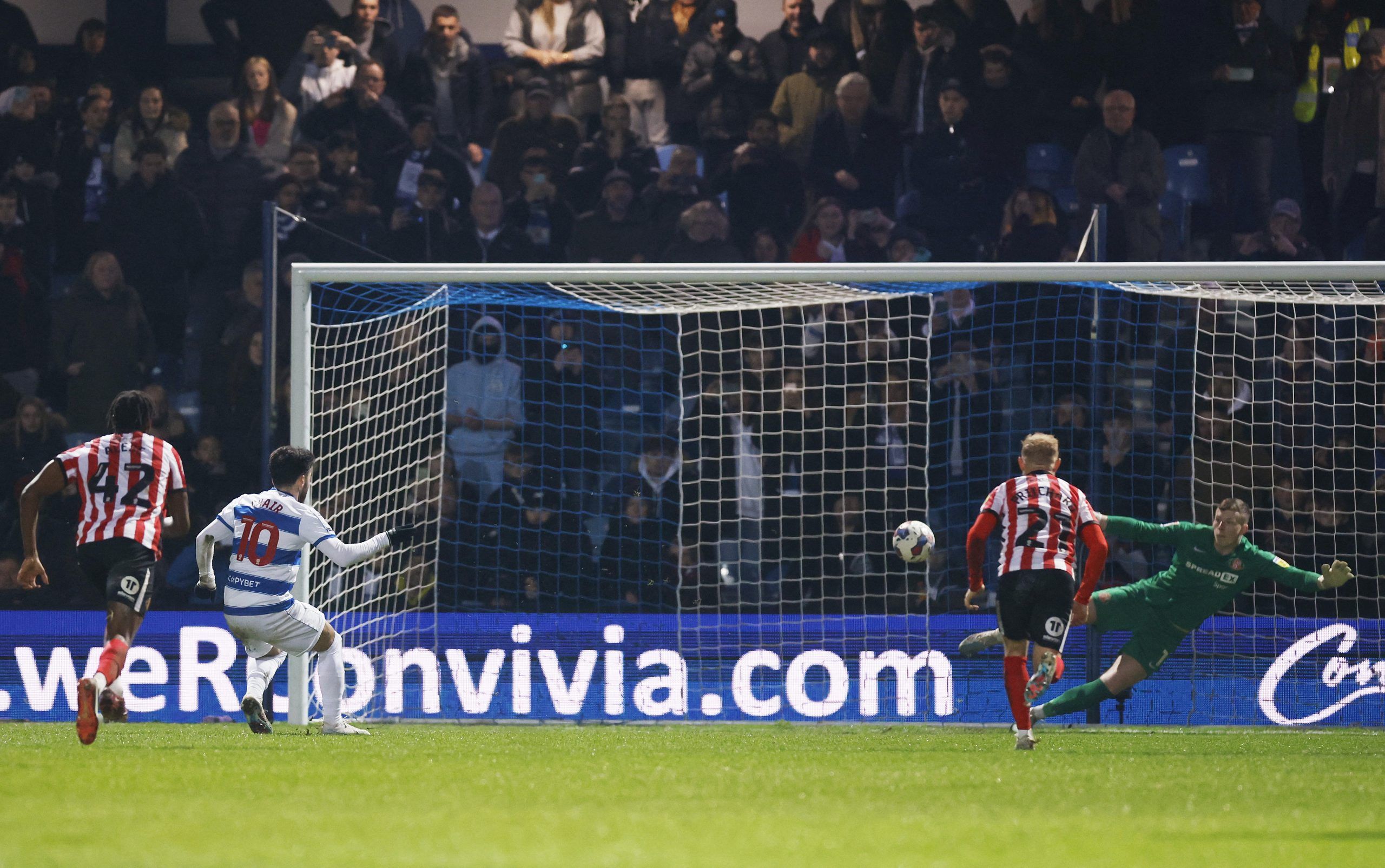 Soccer Football - Championship - Queens Park Rangers v Sunderland - Loftus Road, London, Britain - February 14, 2023 Sunderland's Anthony Patterson saves the penalty of Queens Park Rangers' Ilias Chair Action Images/Andrew Couldridge EDITORIAL USE ONLY. No use with unauthorized audio, video, data, fixture lists, club/league logos or 'live' services. Online in-match use limited to 75 images, no video emulation. No use in betting, games or single club /league/player publications.  Please contact y