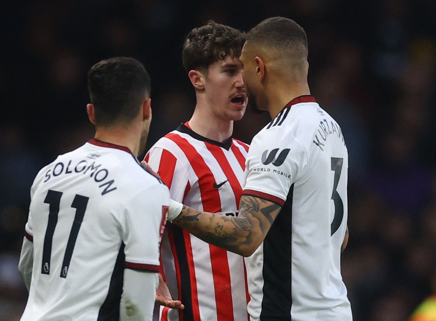 Soccer Football - FA Cup - Fourth Round - Fulham v Sunderland - Craven Cottage, London, Britain - January 28, 2023 Fulham's Manor Solomon and Layvin Kurzawa clash with Sunderland's Trai Hume Action Images via Reuters/Paul Childs