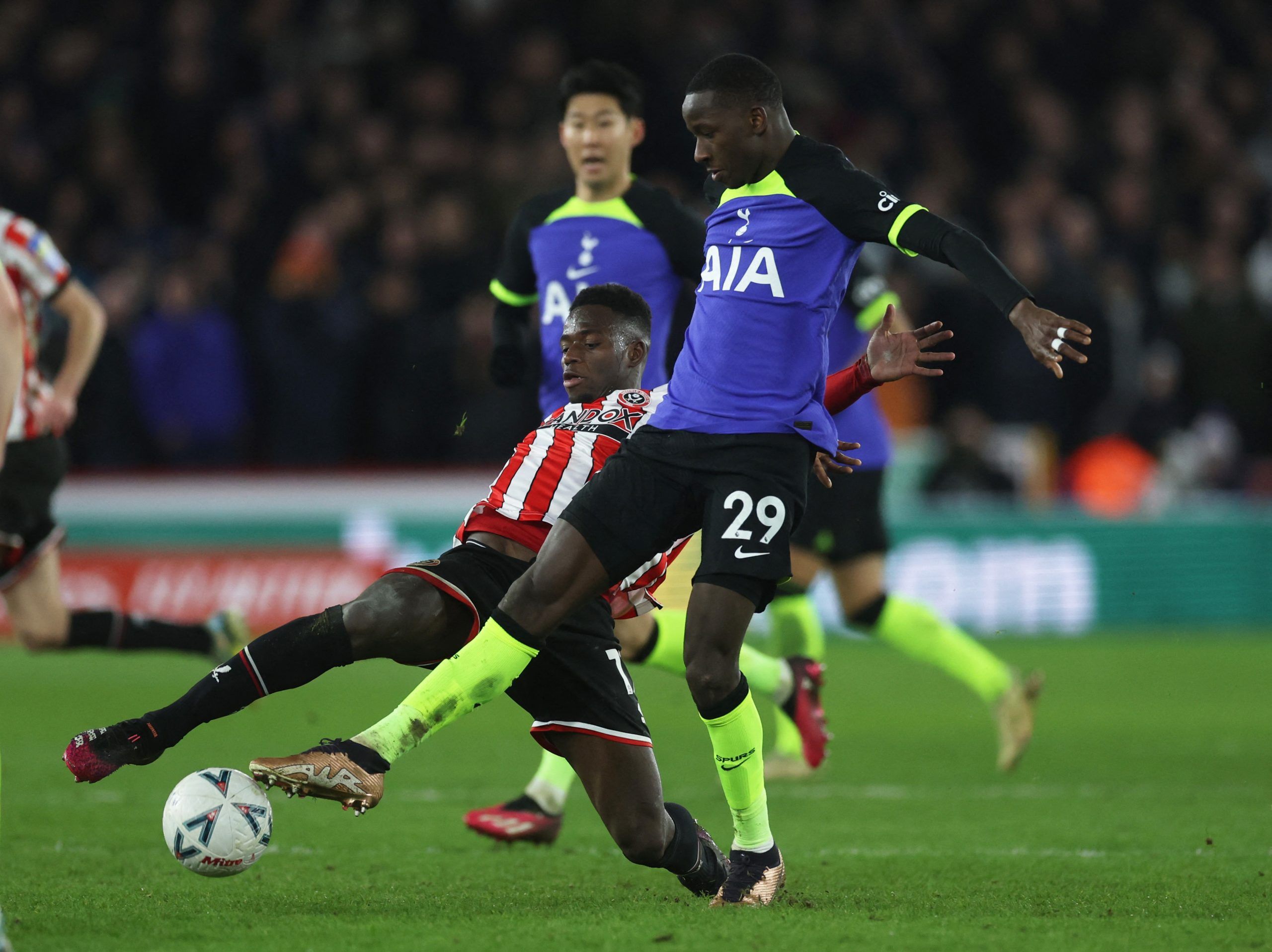 Soccer Football - FA Cup - Fifth Round - Sheffield United v Tottenham Hotspur - Bramall Lane, Sheffield, Britain - March 1, 2023 Tottenham Hotspur's Pape Matar Sarr in action with Sheffield United's Ismaila Coulibaly Action Images via Reuters/Lee Smith