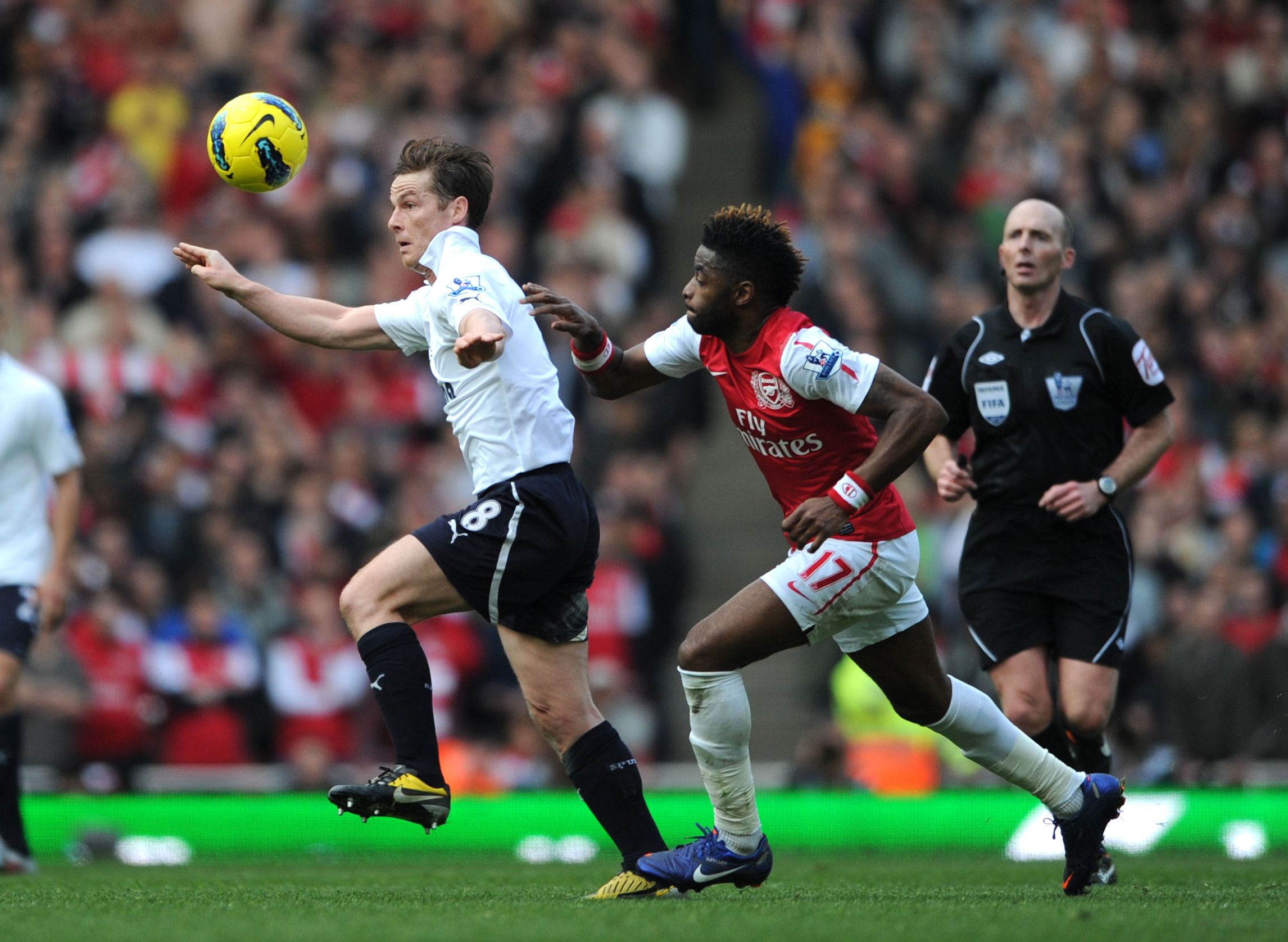 Tottenham Hotspur in action against Alex Song - Arsenal