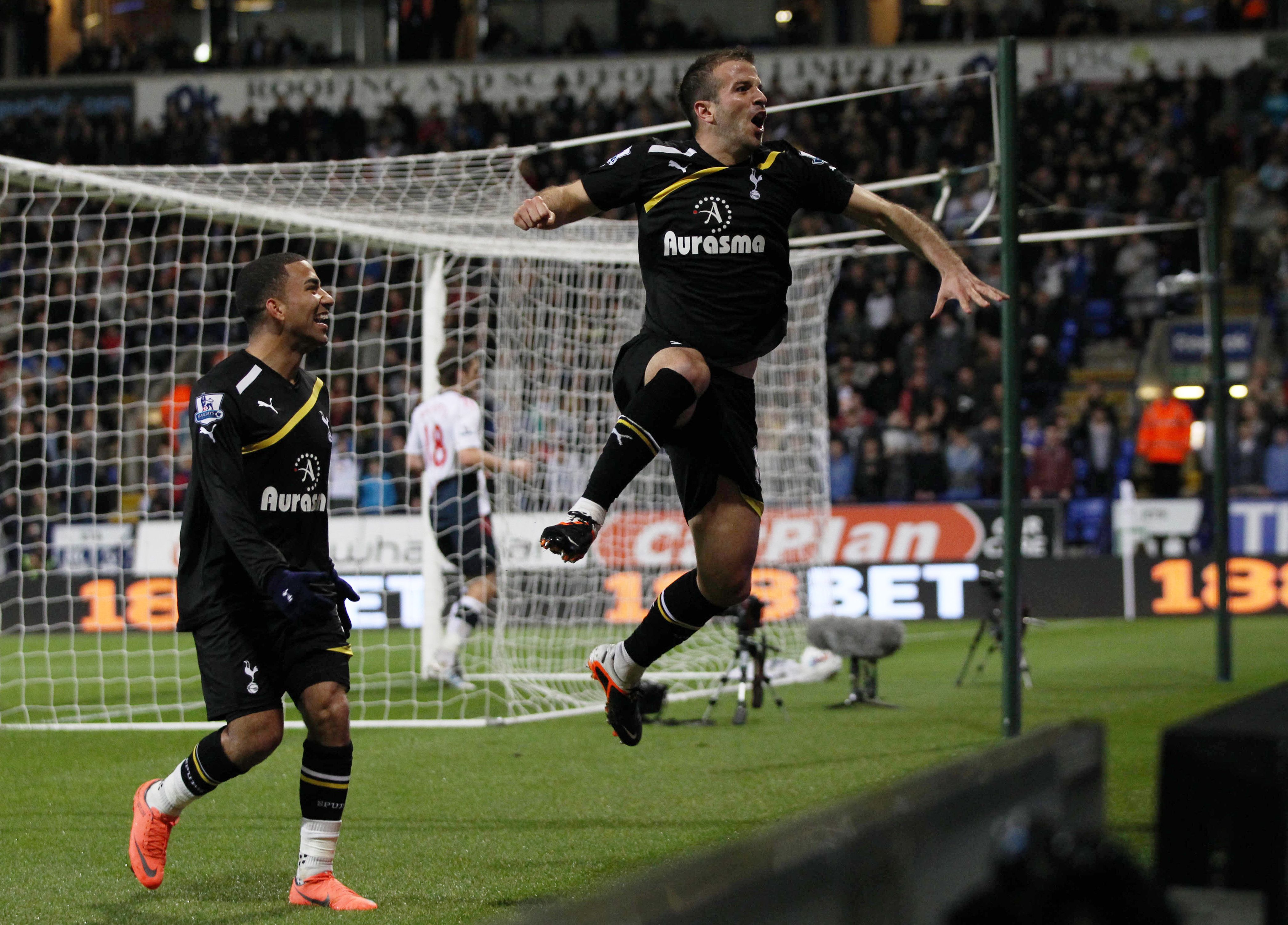 Tottenham's Rafael Van Der Vaart celebrates scoring his sides second goal with Aaron Lennon