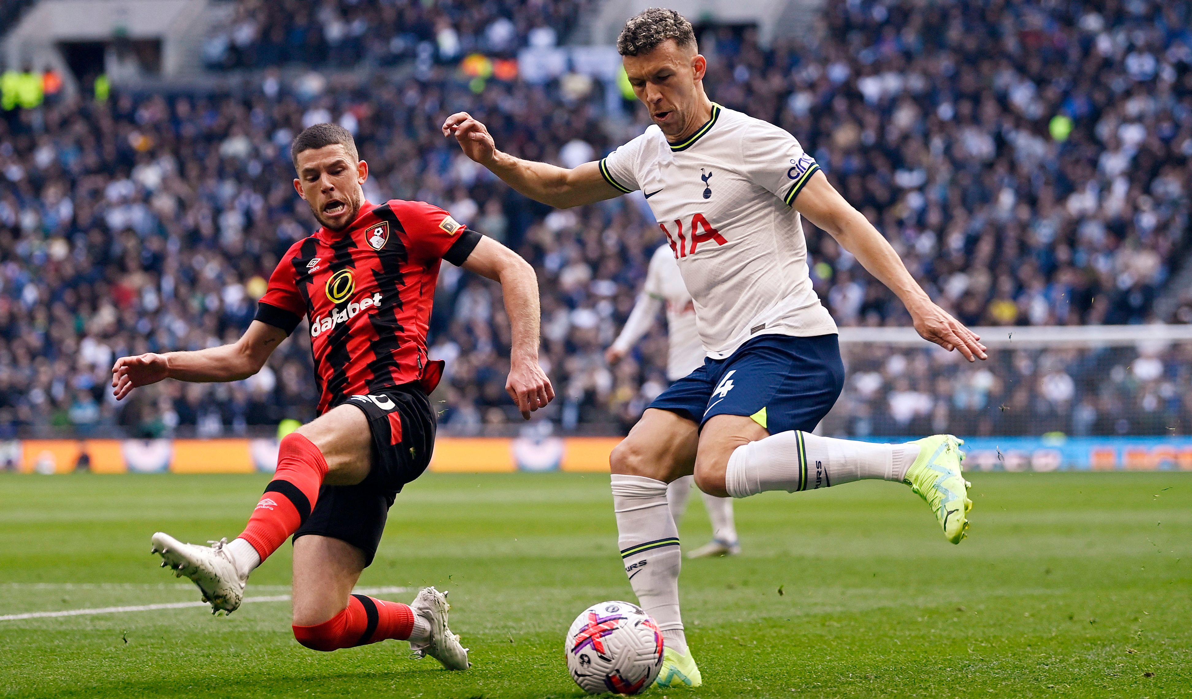 AFC Bournemouth's Ryan Christie in action with Tottenham Hotspur's Ivan Perisic (1)