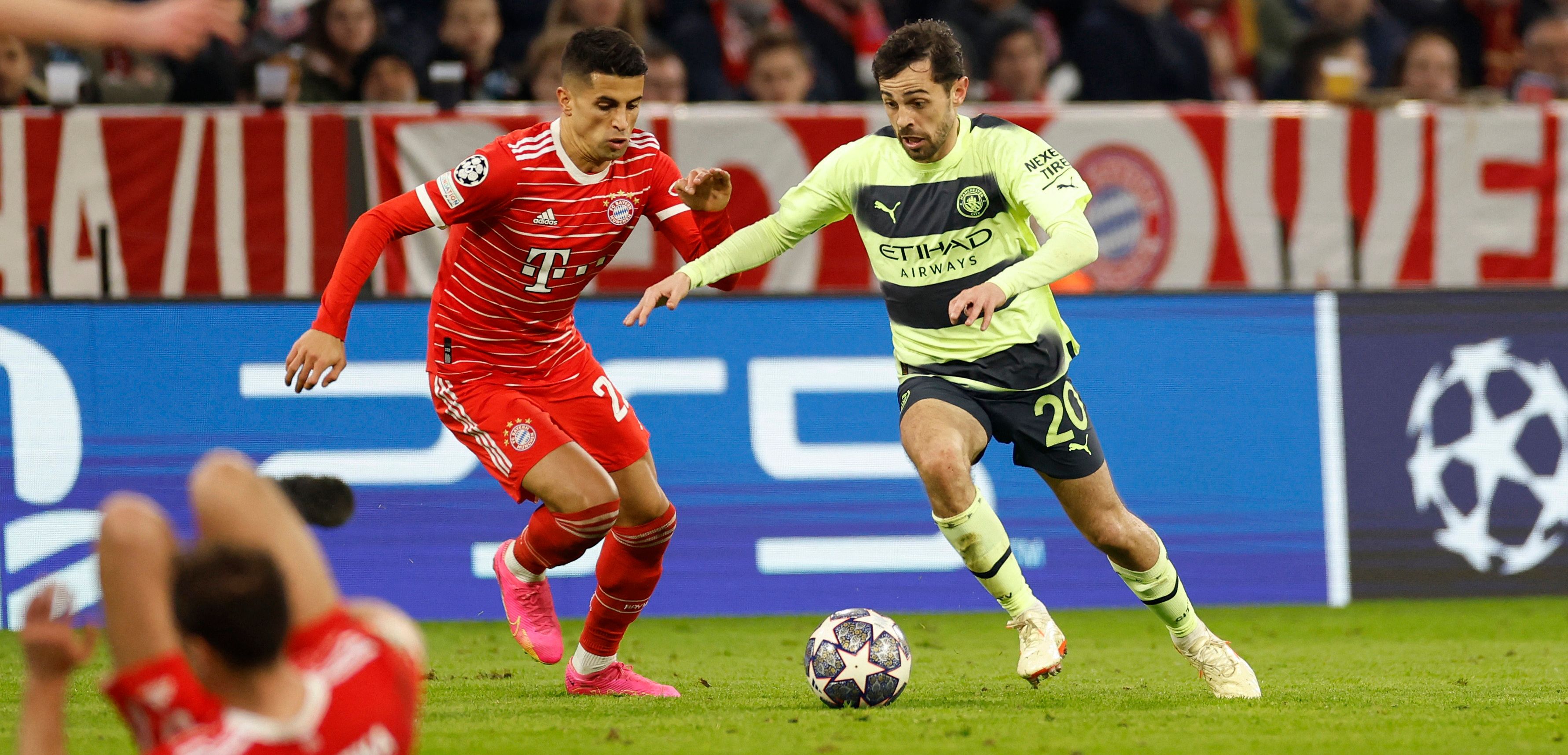 Manchester City's Bernardo Silva in action with Bayern Munich's Joao Cancelo (2)