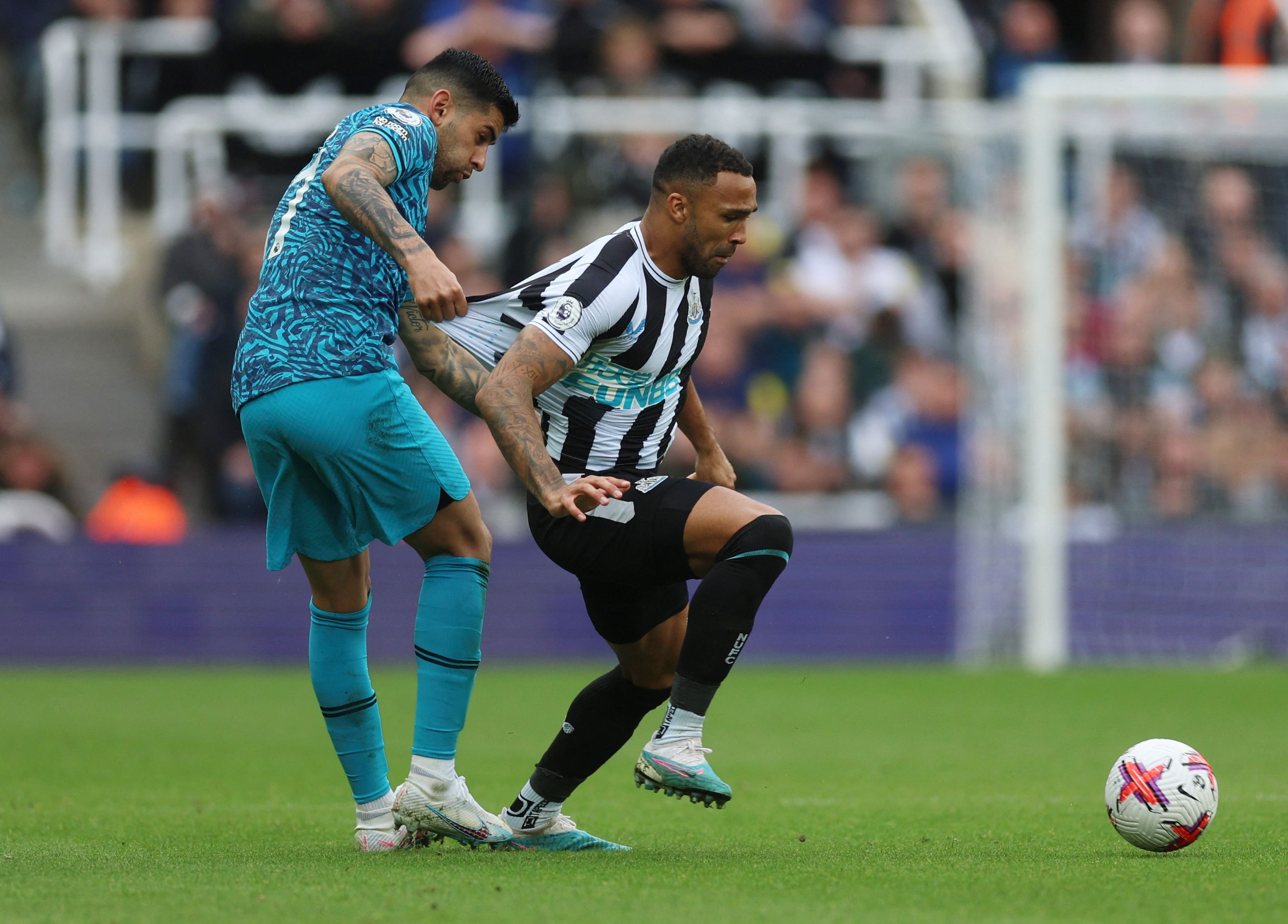 Newcastle United's Callum Wilson in action with Tottenham Hotspur's Cristian Romero 