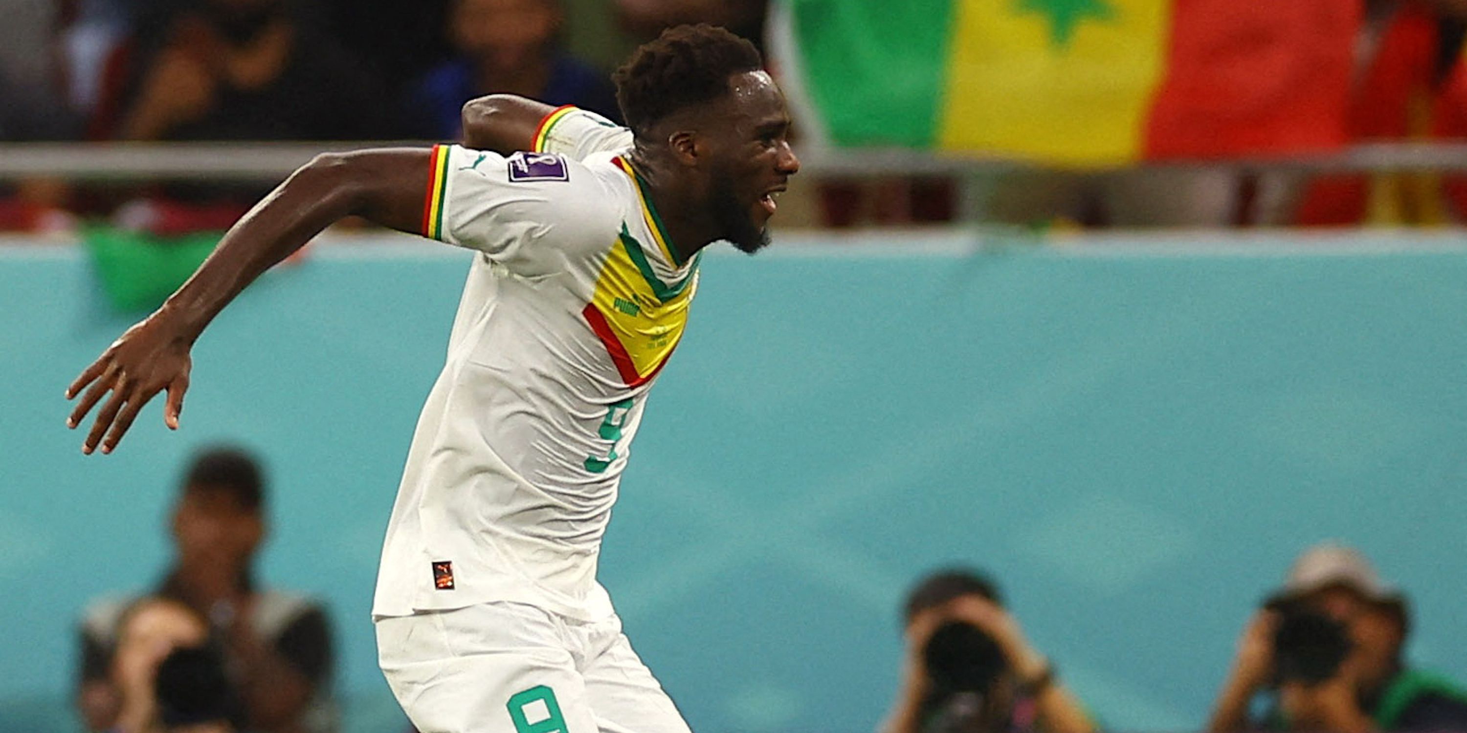 Senegal's Boulaye Dia celebrates
