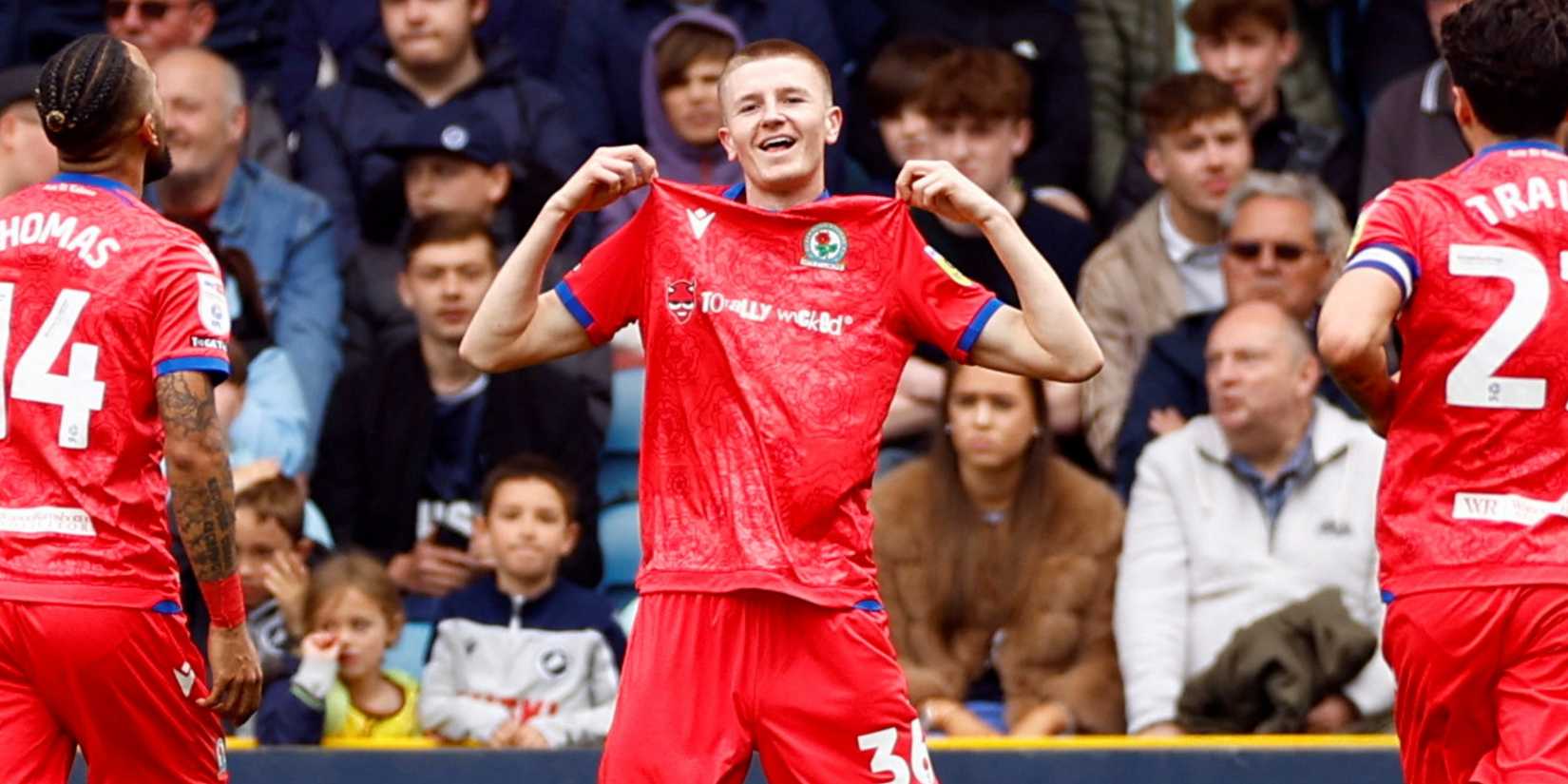 Midfielder Adam Wharton celebrating for Blackburn Rovers. 