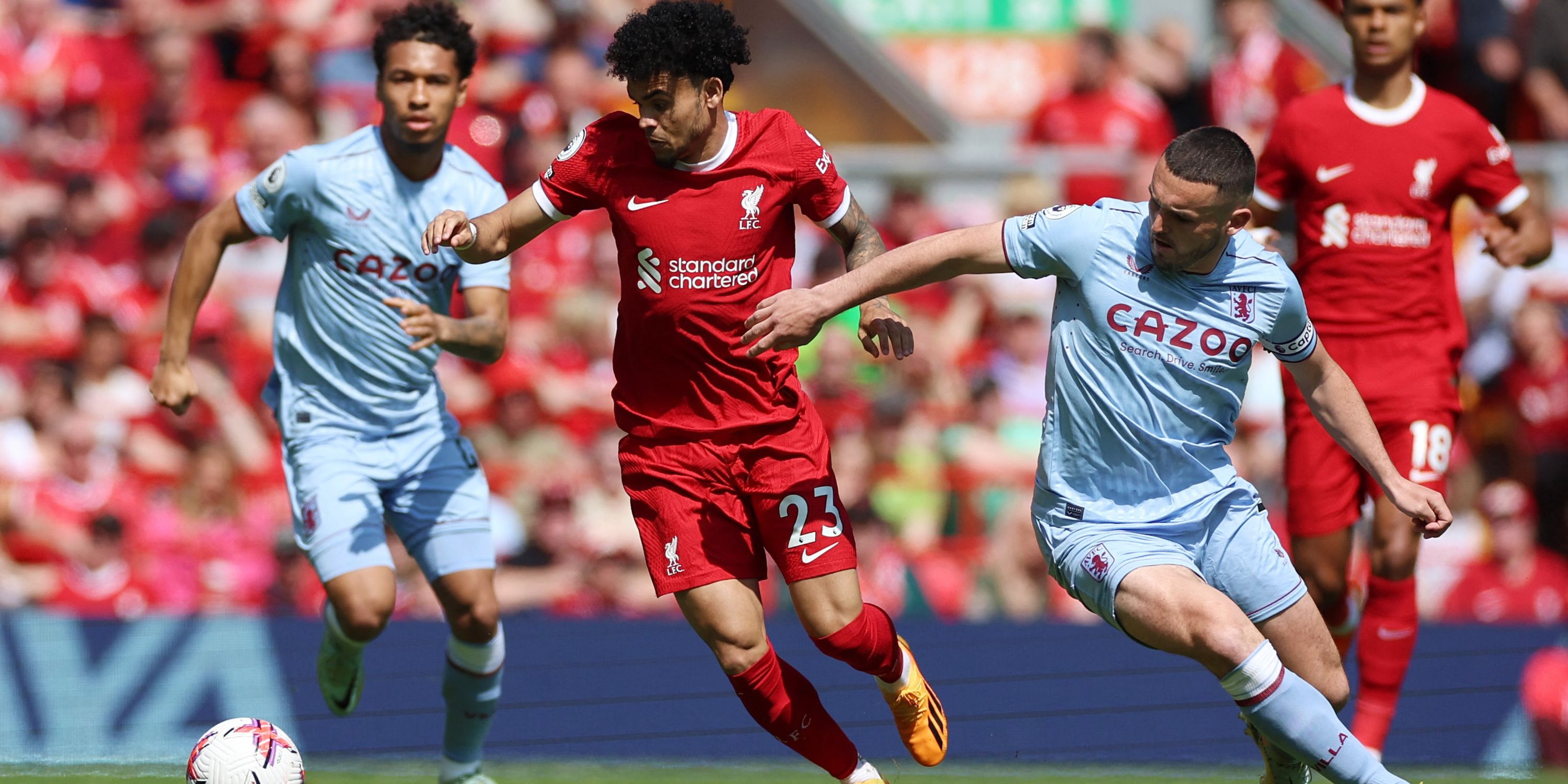 Liverpool's Luis Diaz in action with Aston Villa's John McGinn