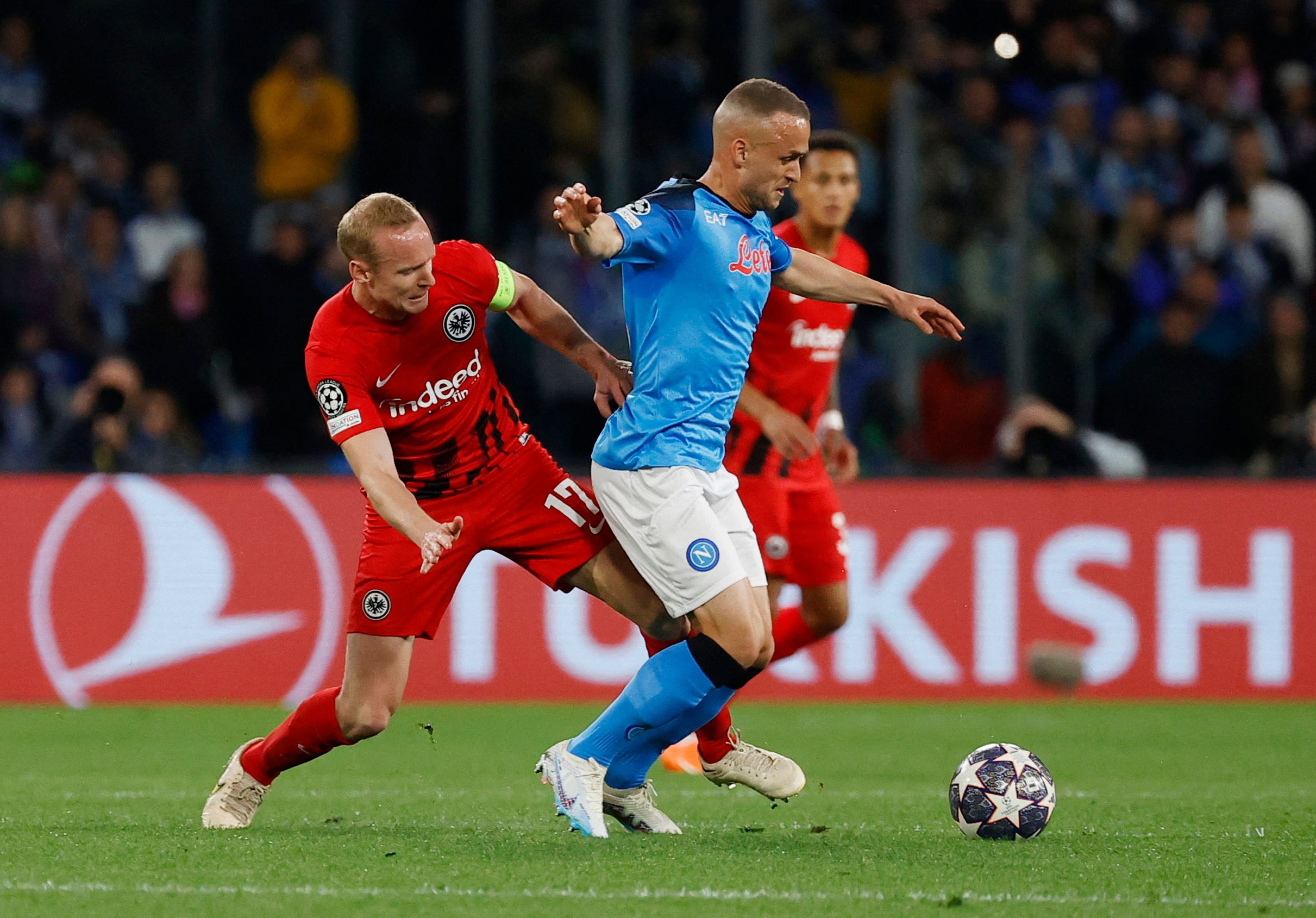 Napoli's Stanislav Lobotka in action with Eintracht Frankfurt's Sebastian Rode