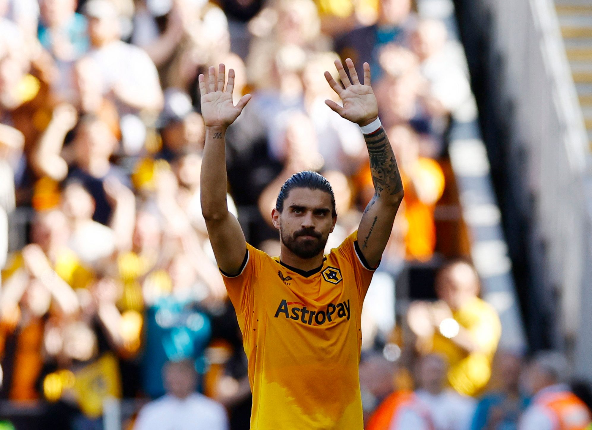 Ruben Neves waves at the Wolves fans