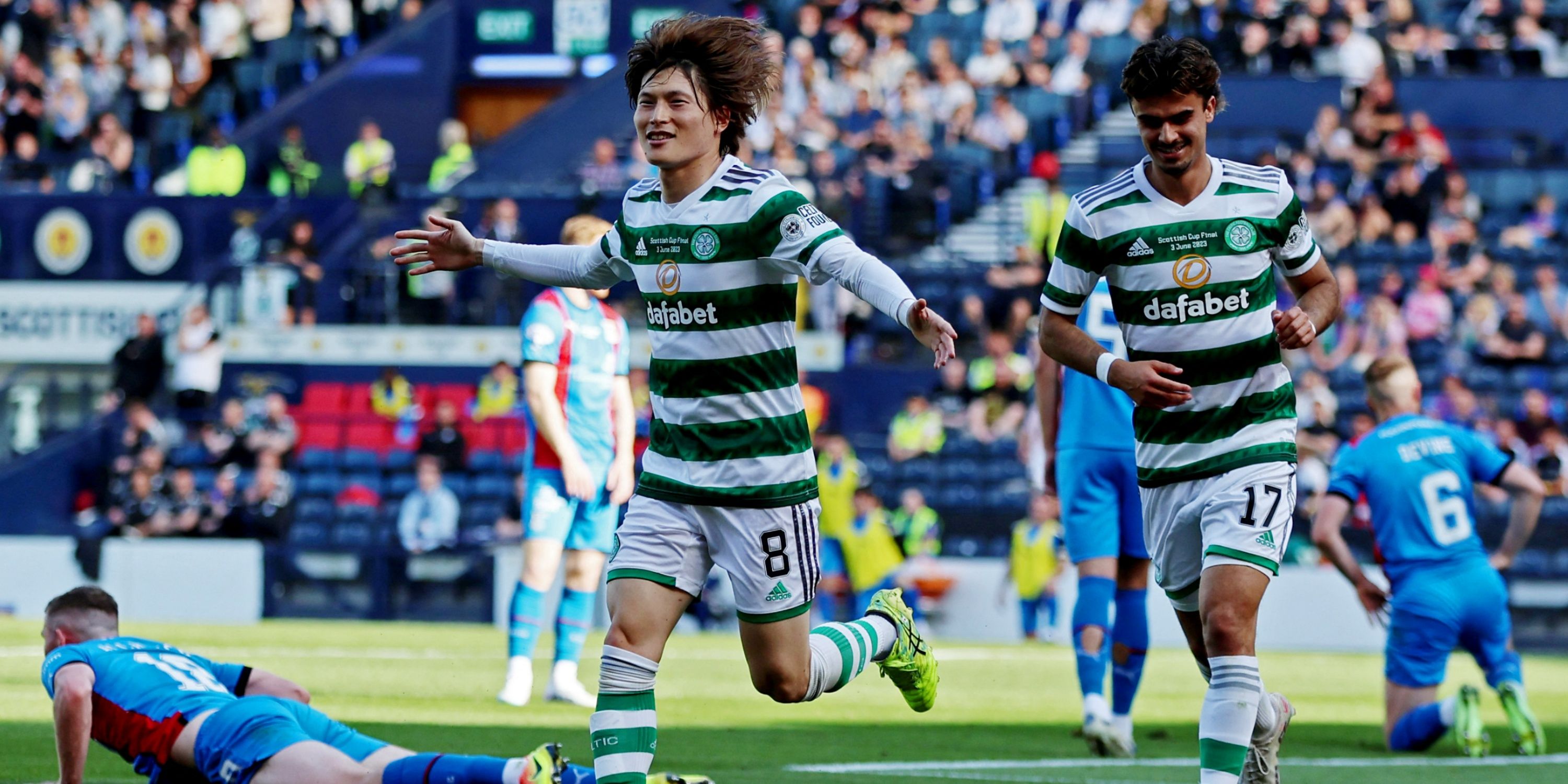 Celtic star Kyogo Furuhashi seems impressed as journalist brings