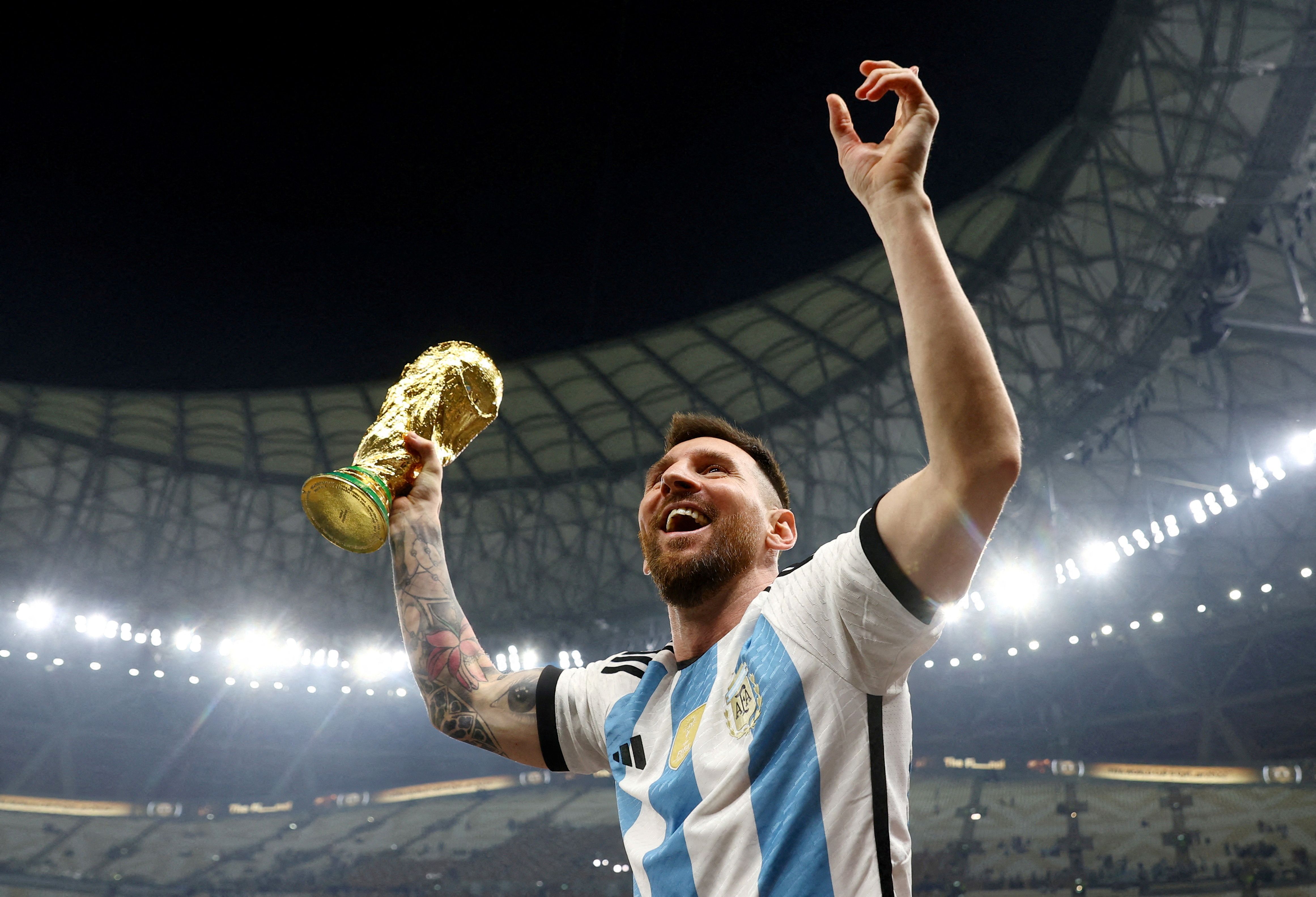 Lionel Messi lifting the World Cup