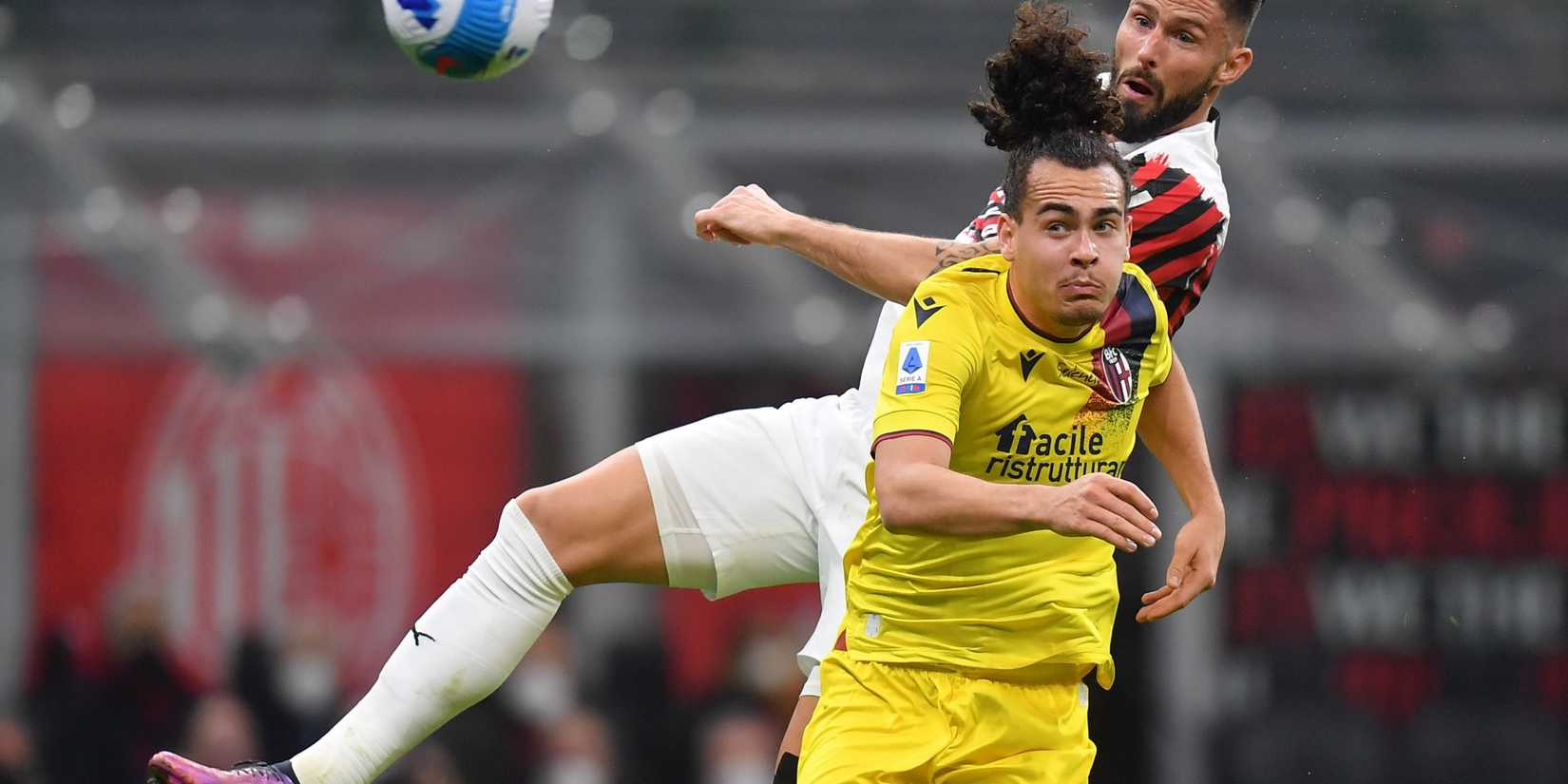 Arthur Theate competes with AC Milan's Olivier Giroud