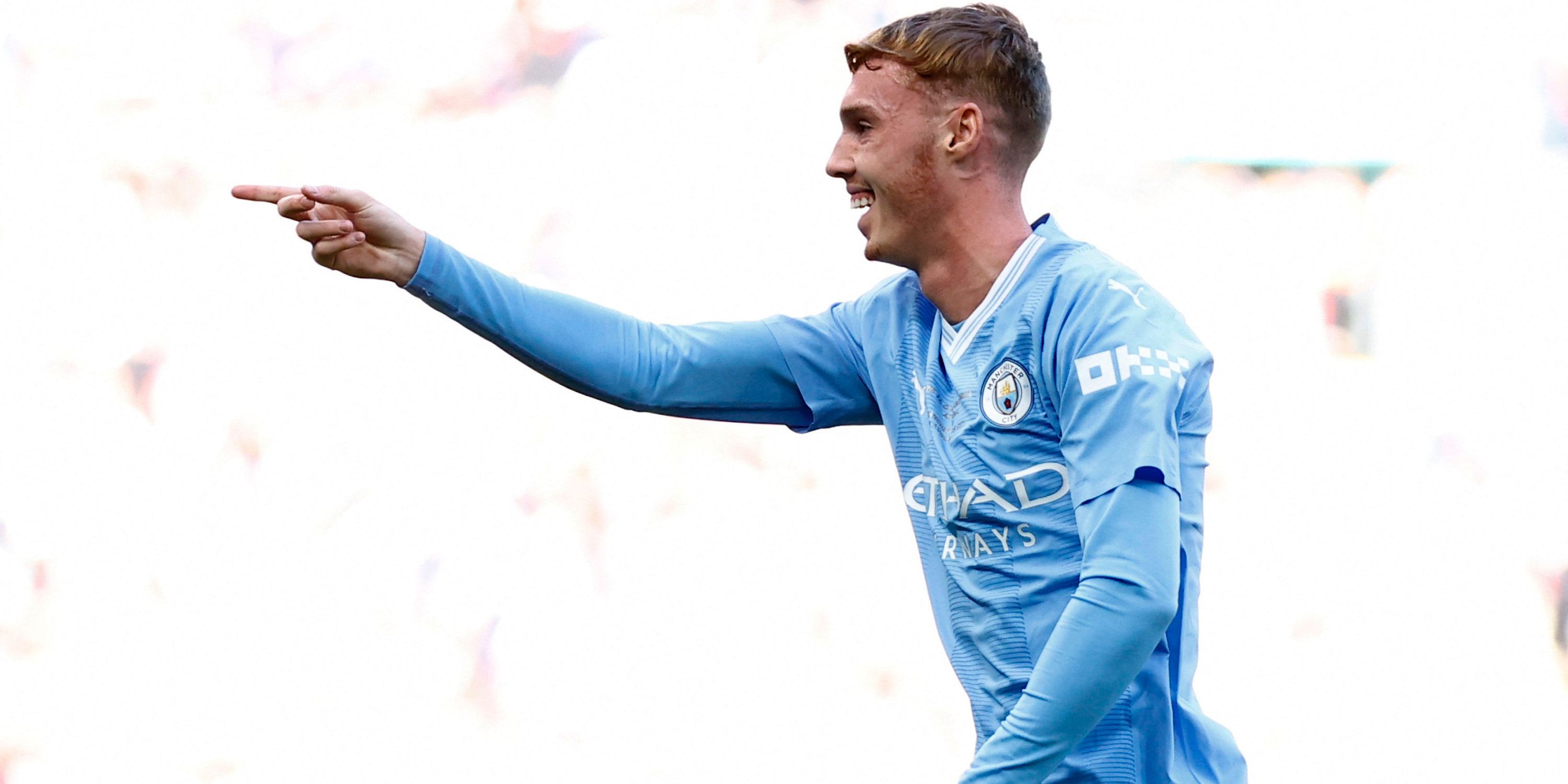   Manchester City's Cole Palmer celebrates scoring their first goal