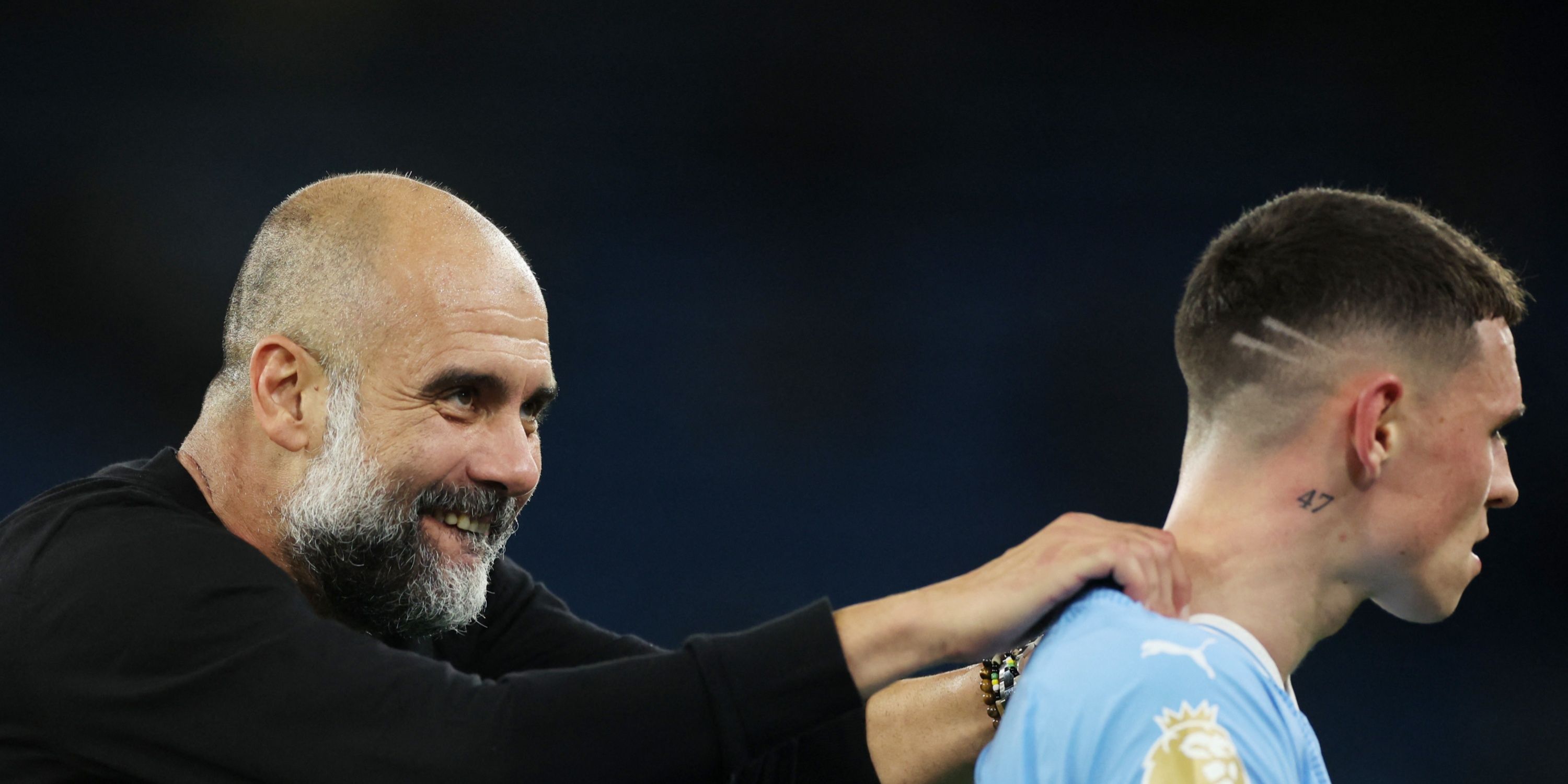 Pep Guardiola and Phil Foden