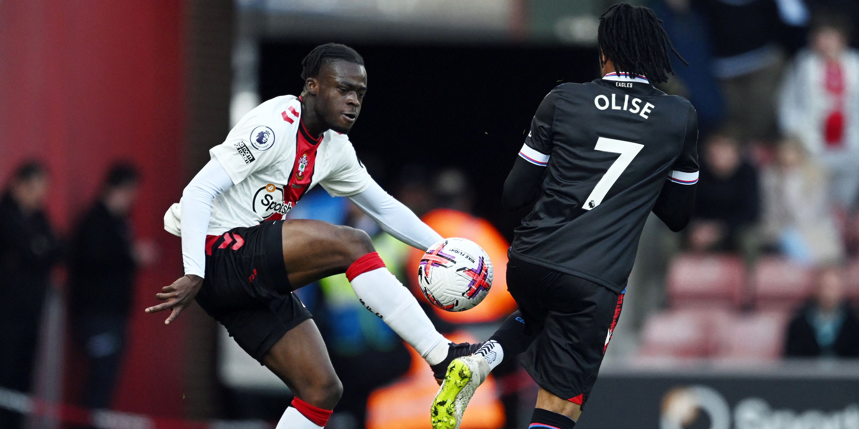 Southampton's Kamaldeen Sulemana in action with Crystal Palace's Michael Olise
