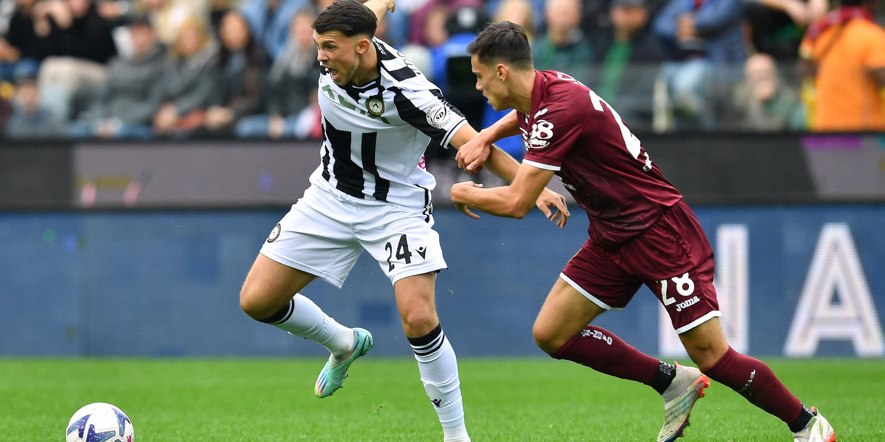 Udinese's Lazar Samardzic in action with Torino's Samuele Ricci