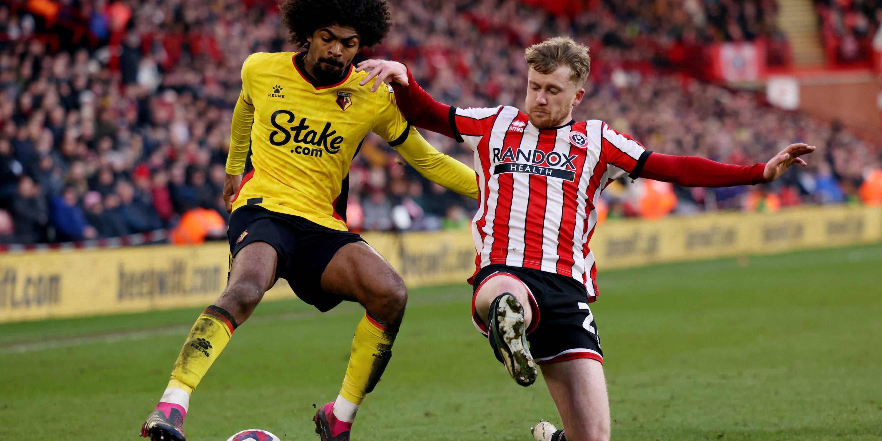 Watford's Hamza Choudhury in action with Sheffield United's Tommy Doyle 