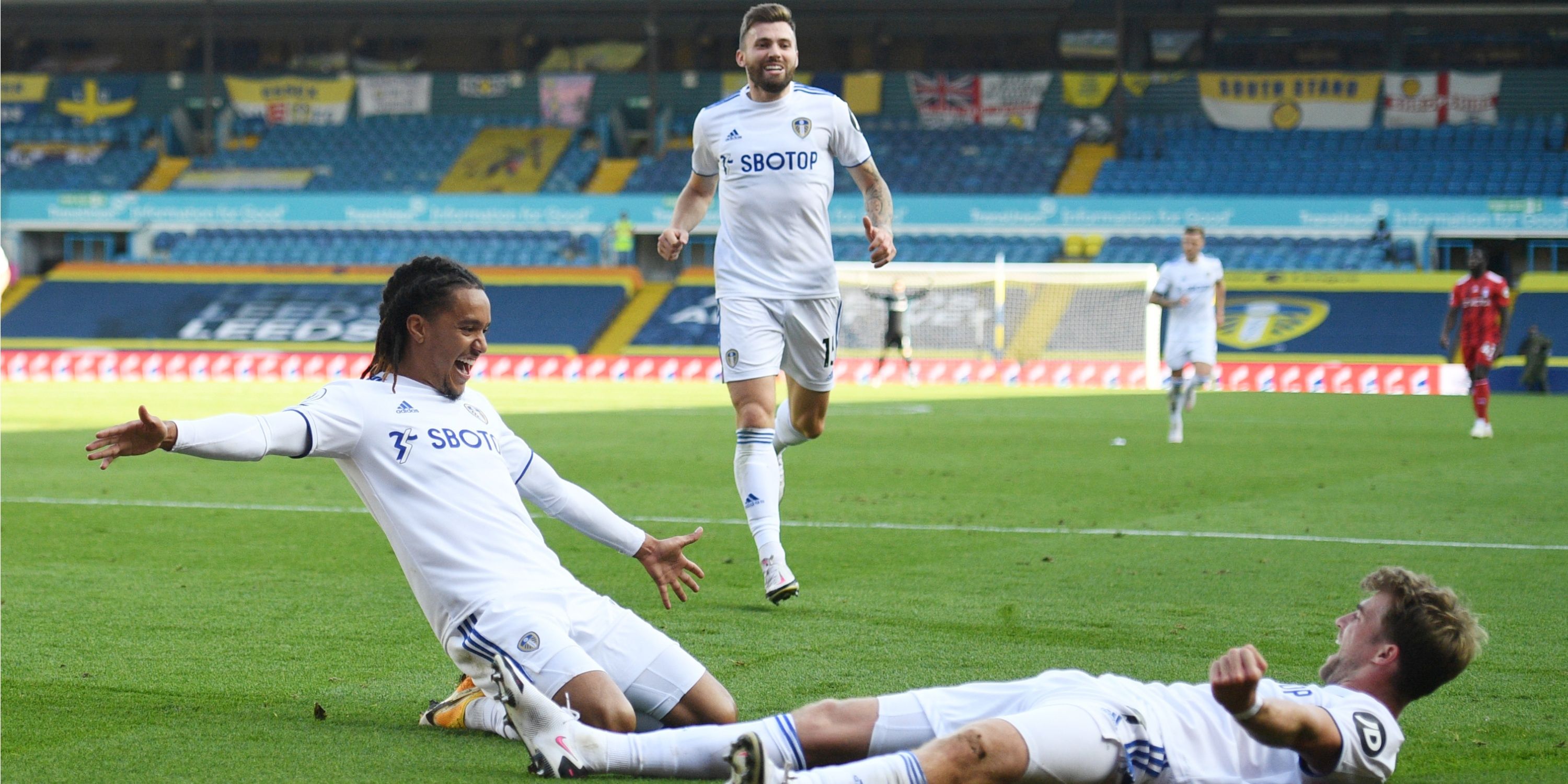 Helder Costa celebrates with Patrick Bamford