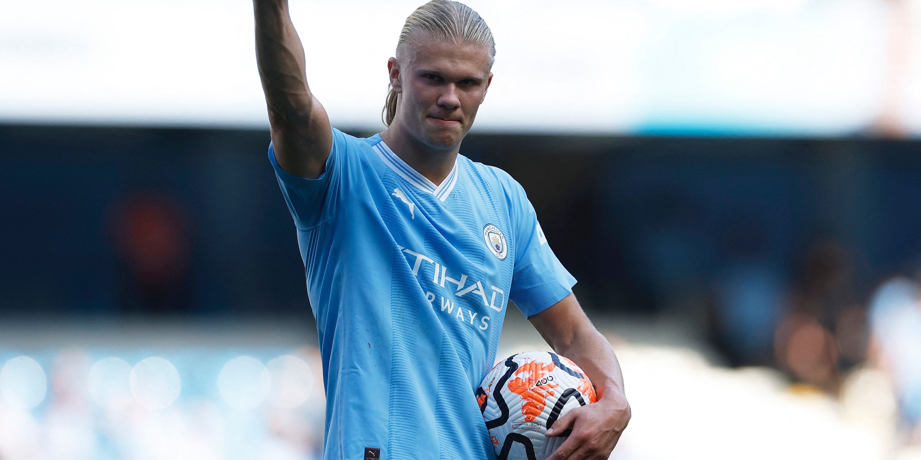 Manchester City's Erling Braut Haaland celebrates with the match ball after the match