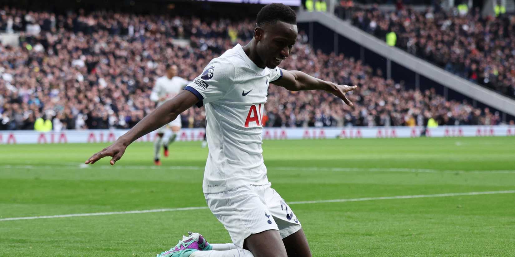 Tottenham midfielder Pape Sarr celebrating a goal.