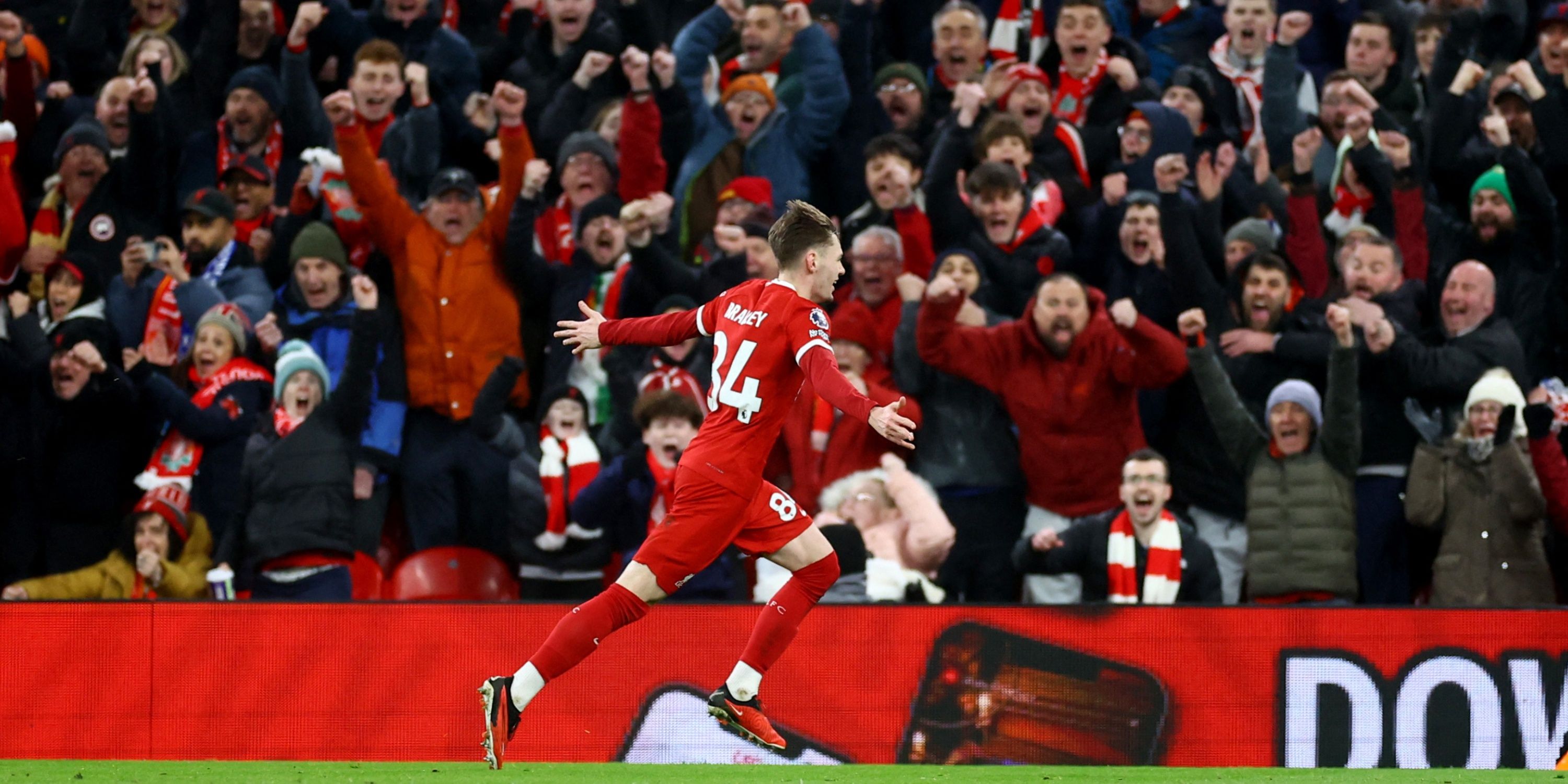 Conor Bradley celebrates after scoring for Liverpool.