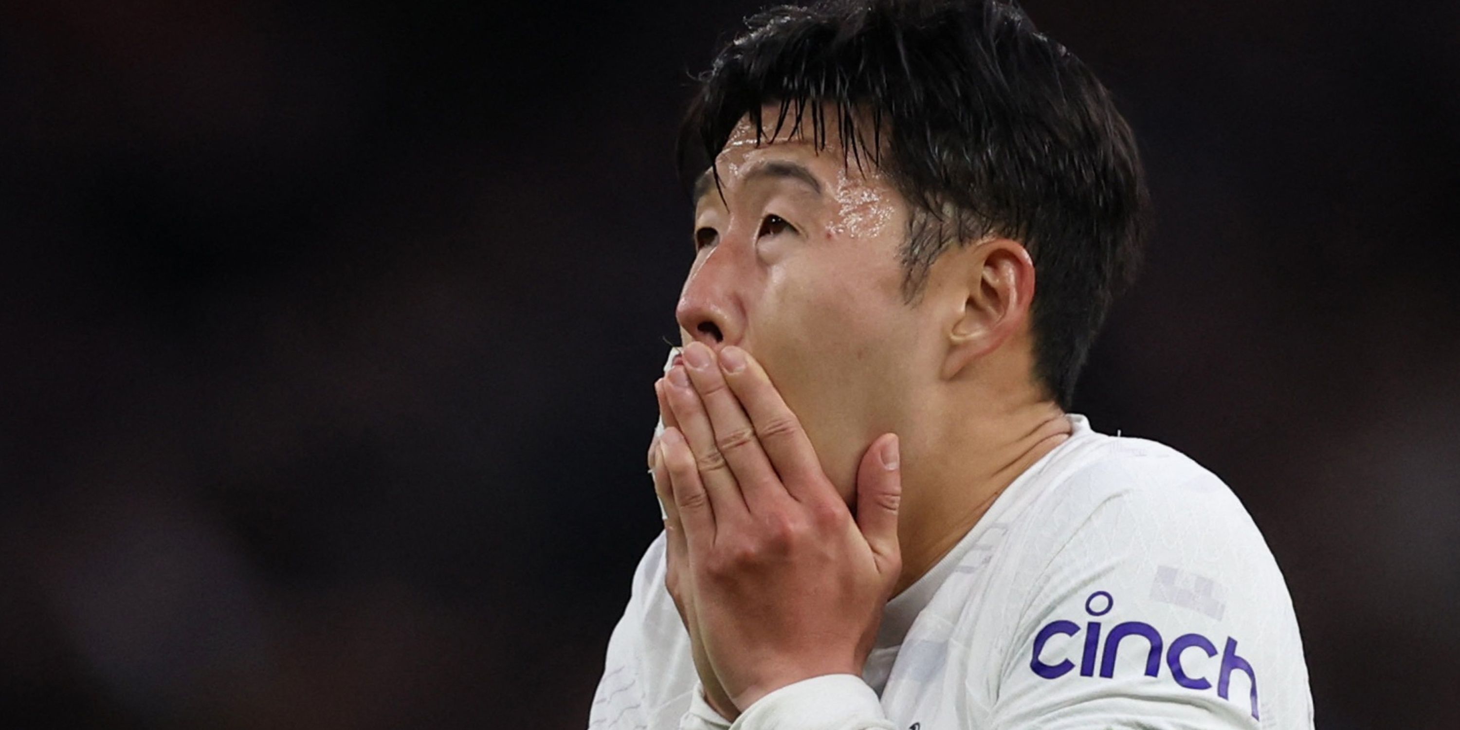 Heung-min Son looks dejected for Tottenham.