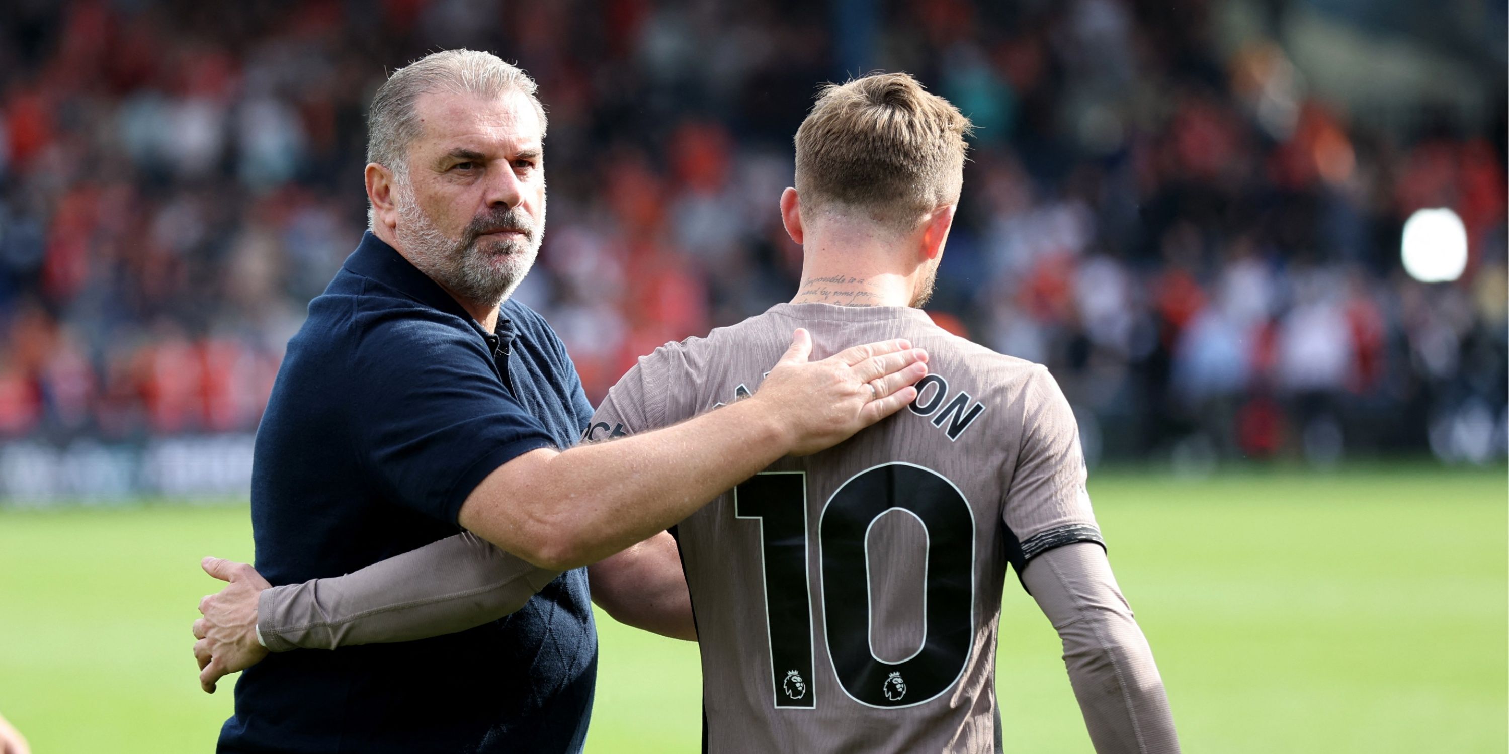 James Maddison with Spurs manager Ange Postecoglou in the Premier League.
