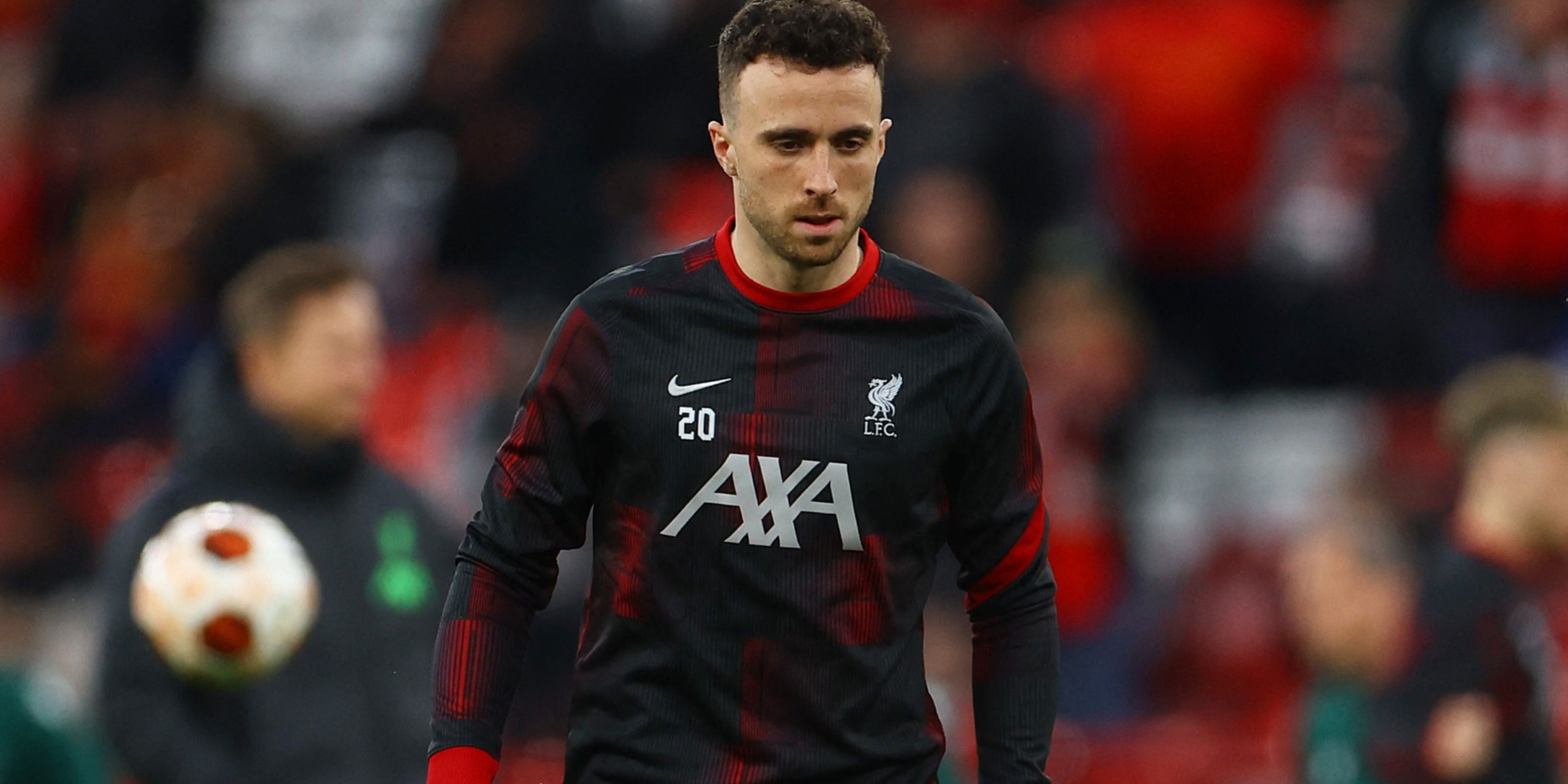 Diogo Jota warming up for Liverpool