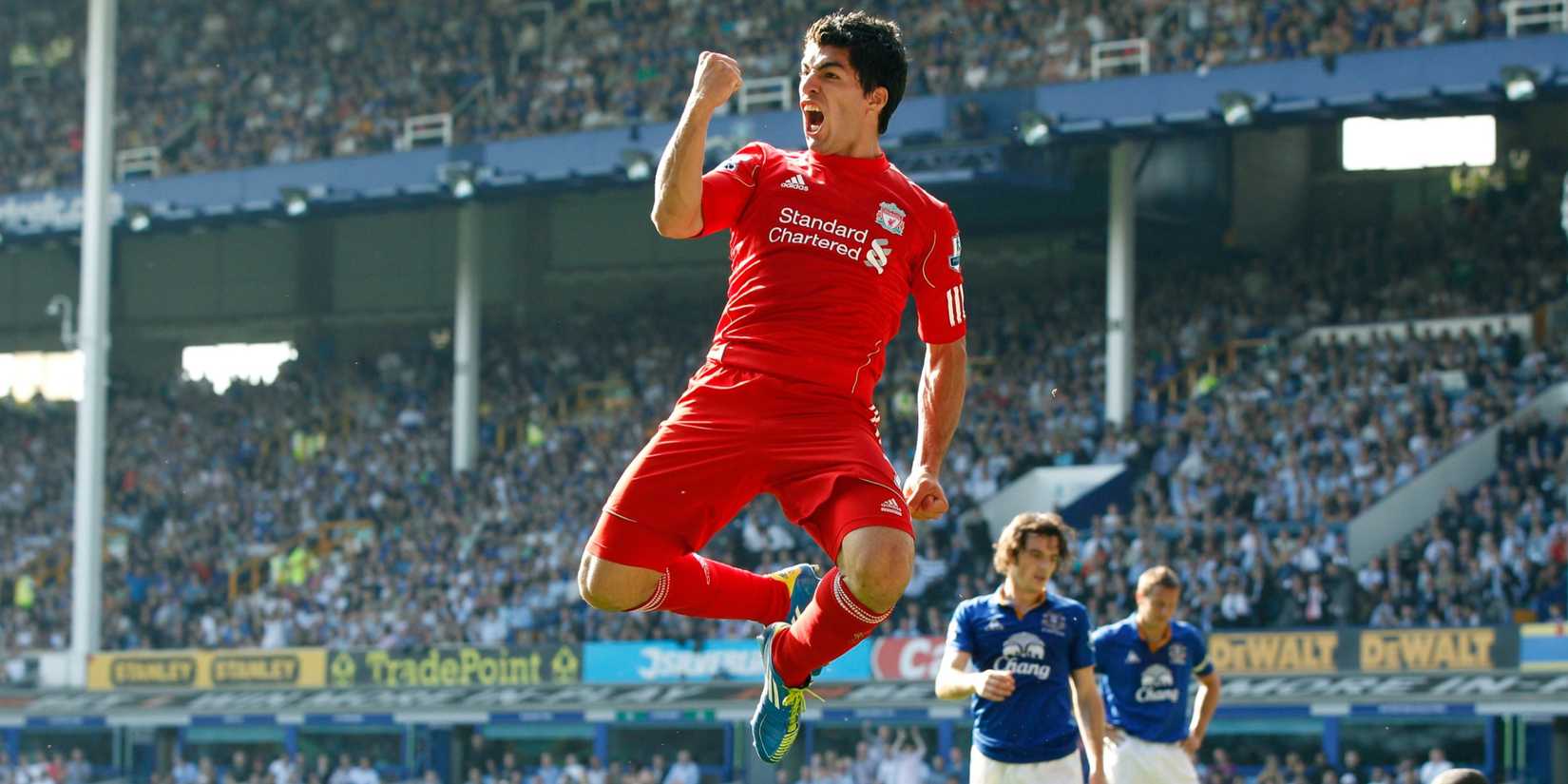 Liverpool striker Luis Suarez celebrates