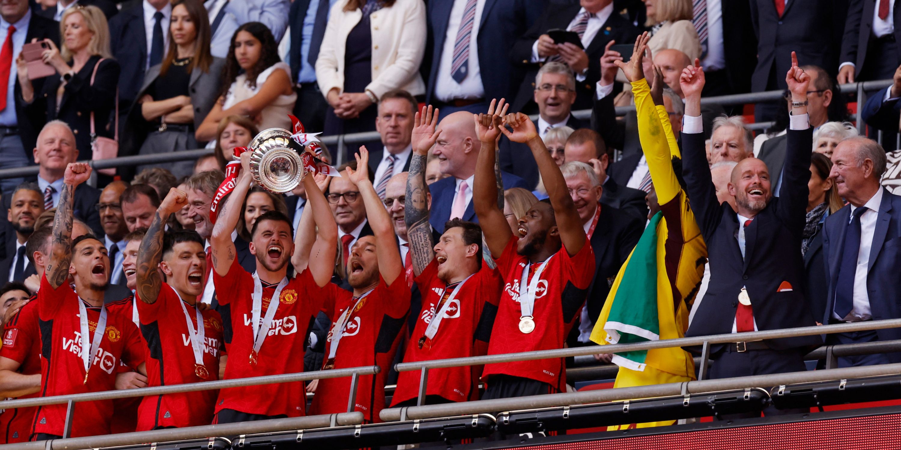 Manchester United's Mason Mount lifts the FA Cup