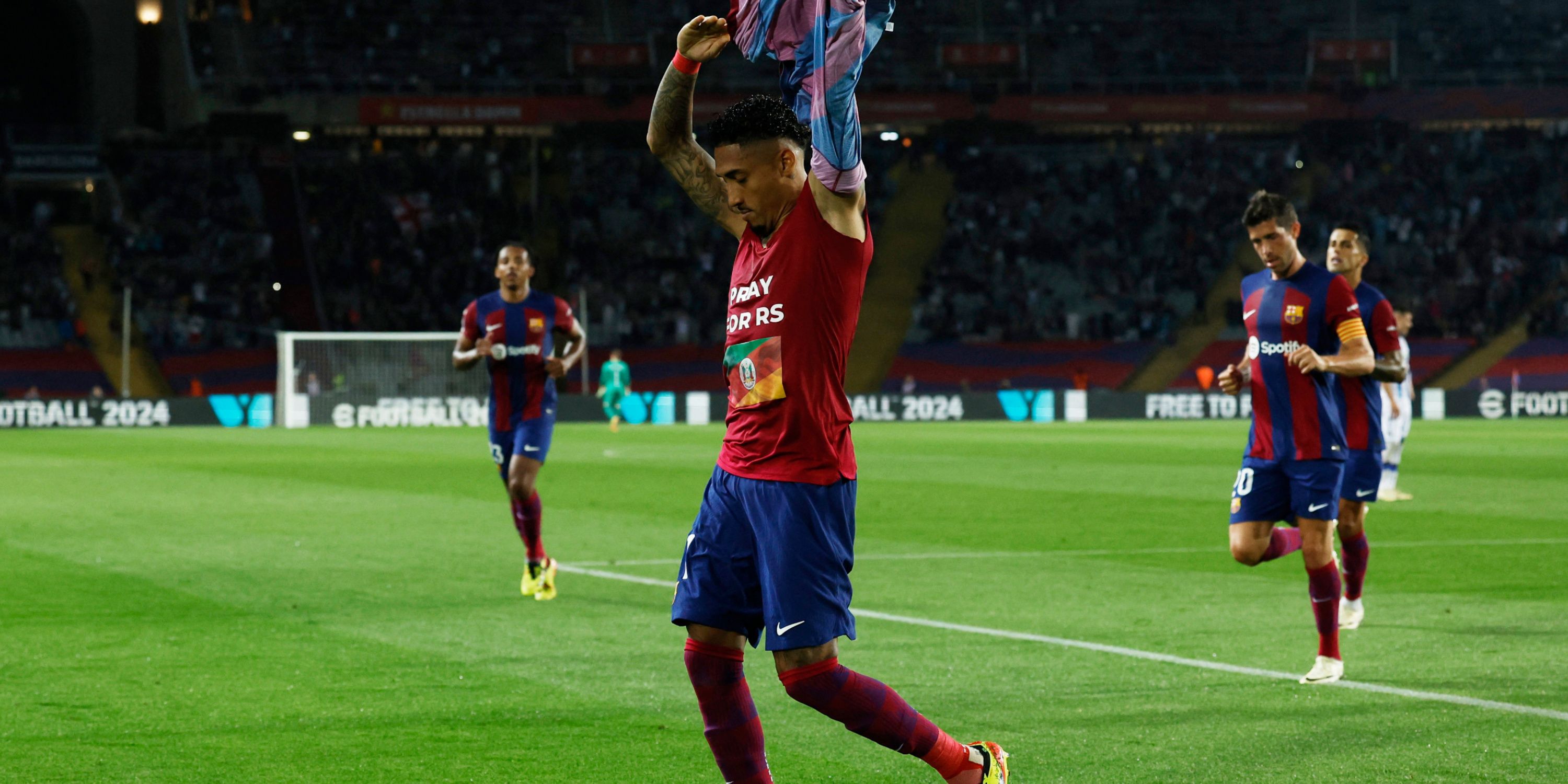 Barcelona striker Raphinha celebrates scoring