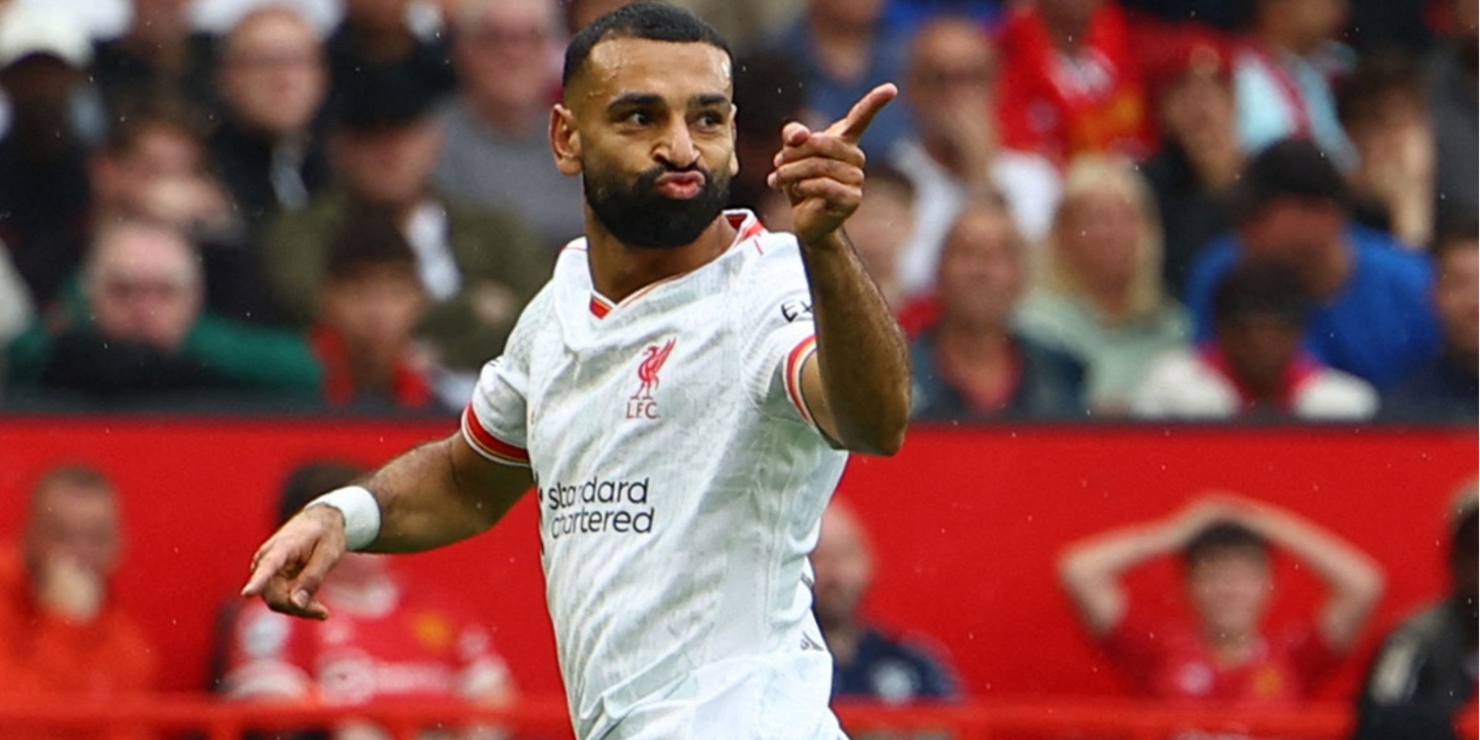 Mohamed Salah celebrates scoring for Liverpool against Manchester United