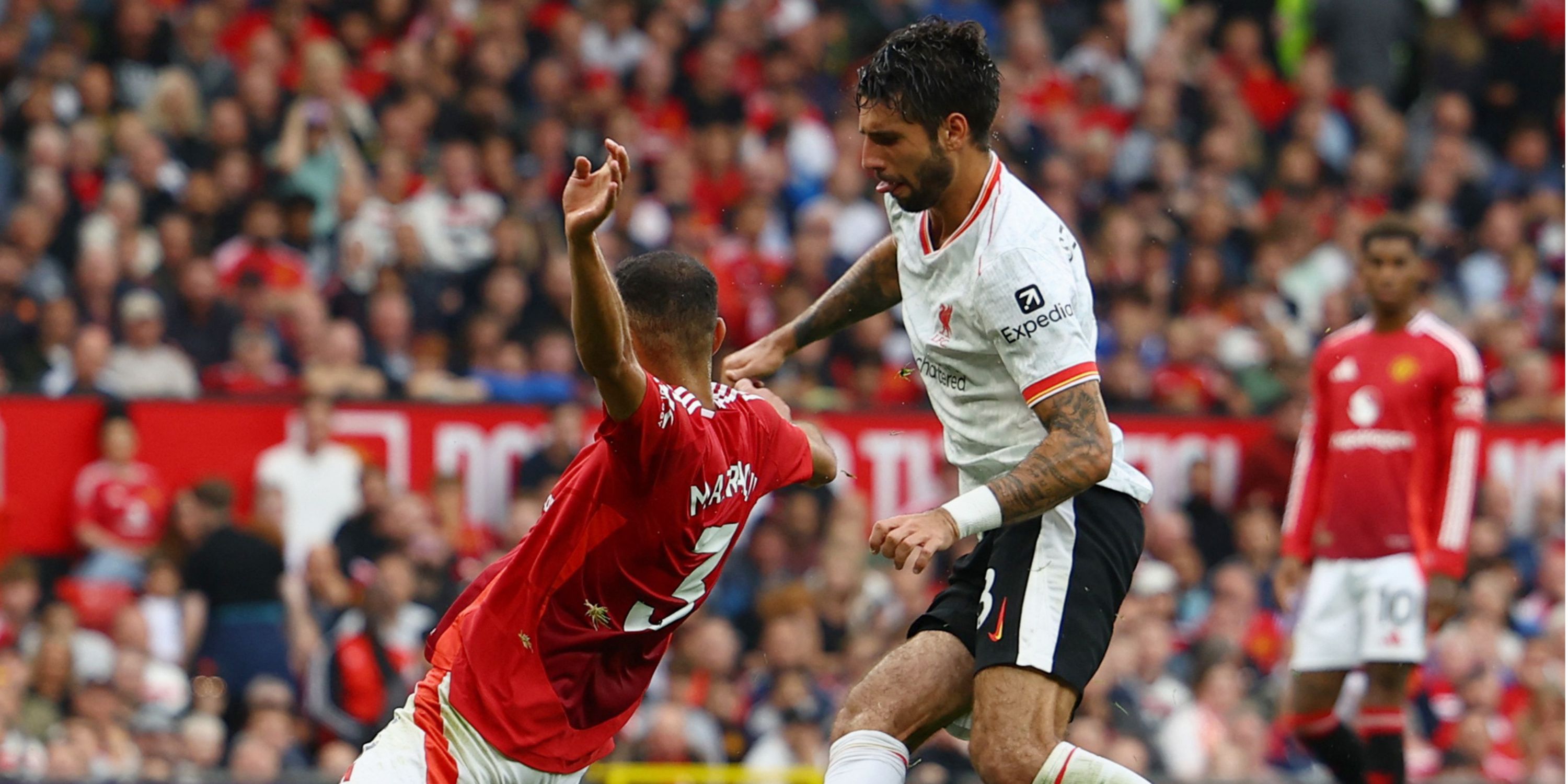 Liverpool's midfielder Dominik Szoboszlai in action against Manchester United