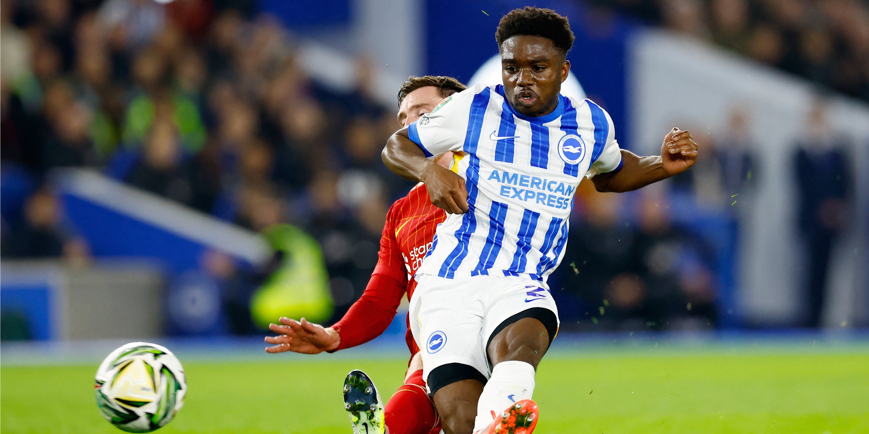 Andy Robertson challenges Tariq Lamptey