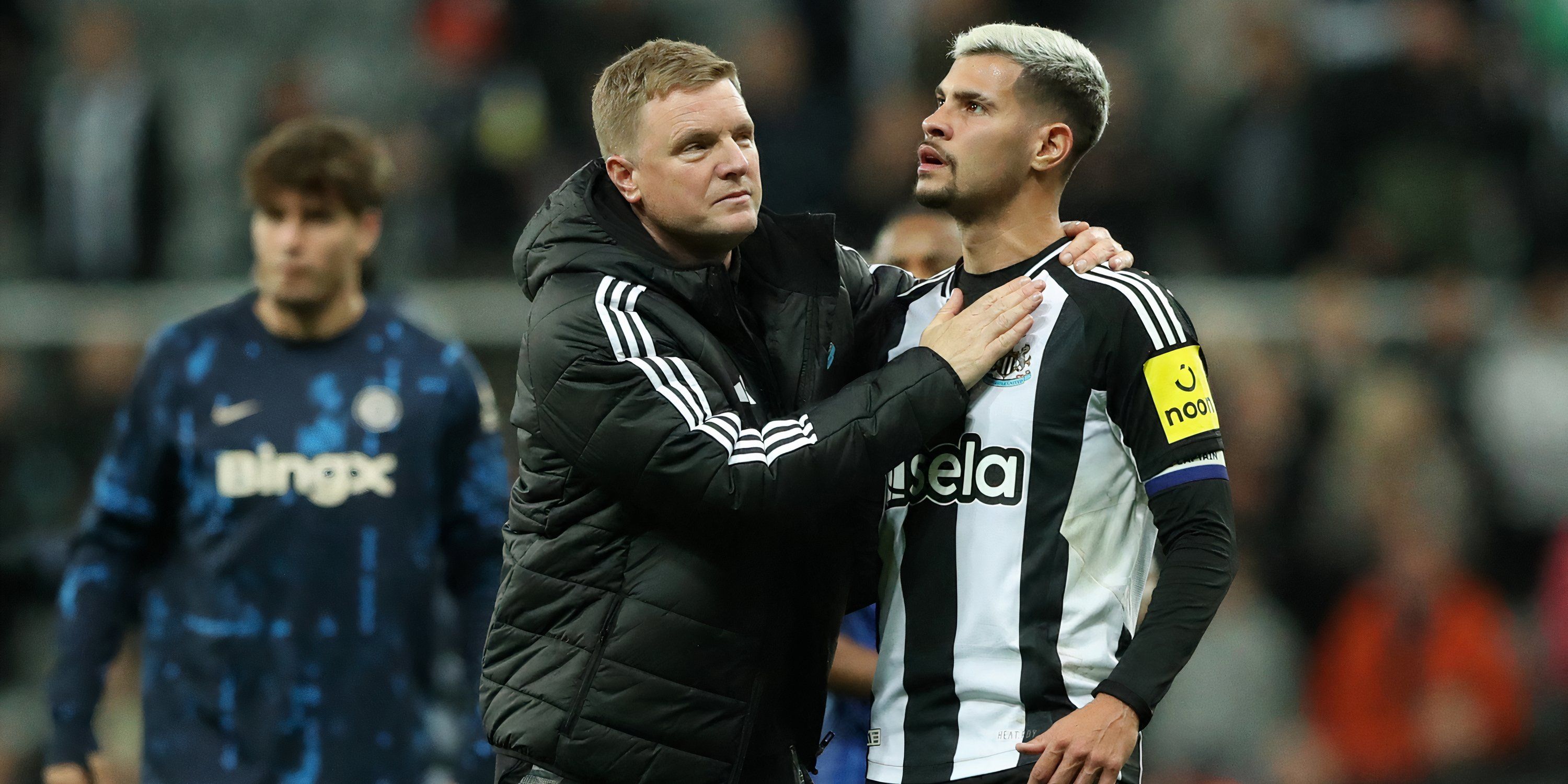 Eddie Howe and Bruno Guimaraes celebrate