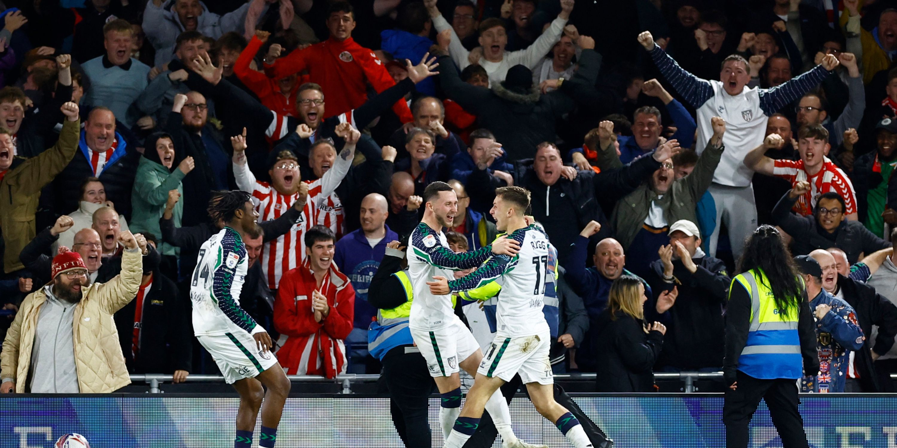 Sunderland midfielder Chris Rigg celebrating with his teammates