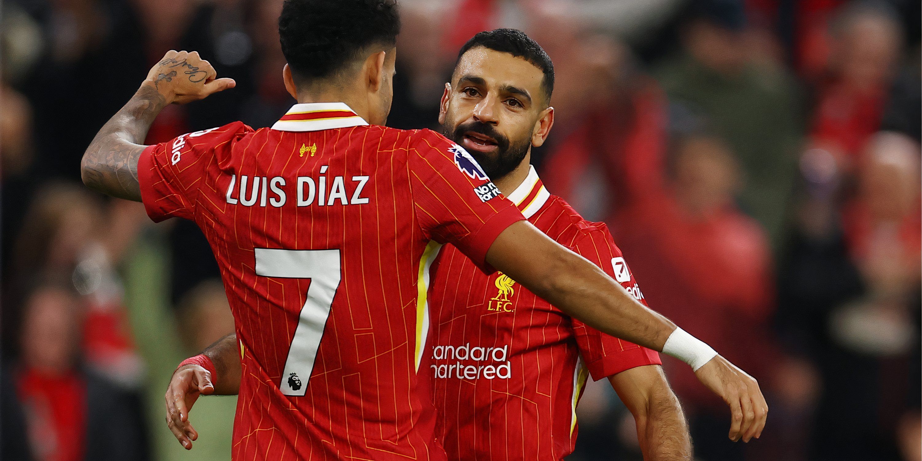 Mohamed Salah celebrates with Luis Diaz