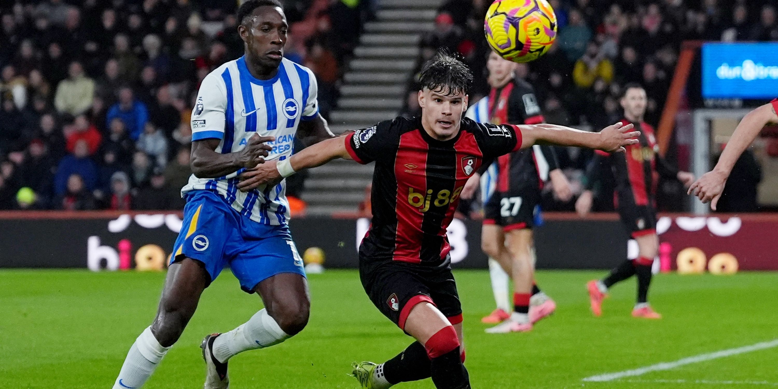 AFC Bournemouth's Milos Kerkez in action with Brighton & Hove Albion's Danny Welbeck