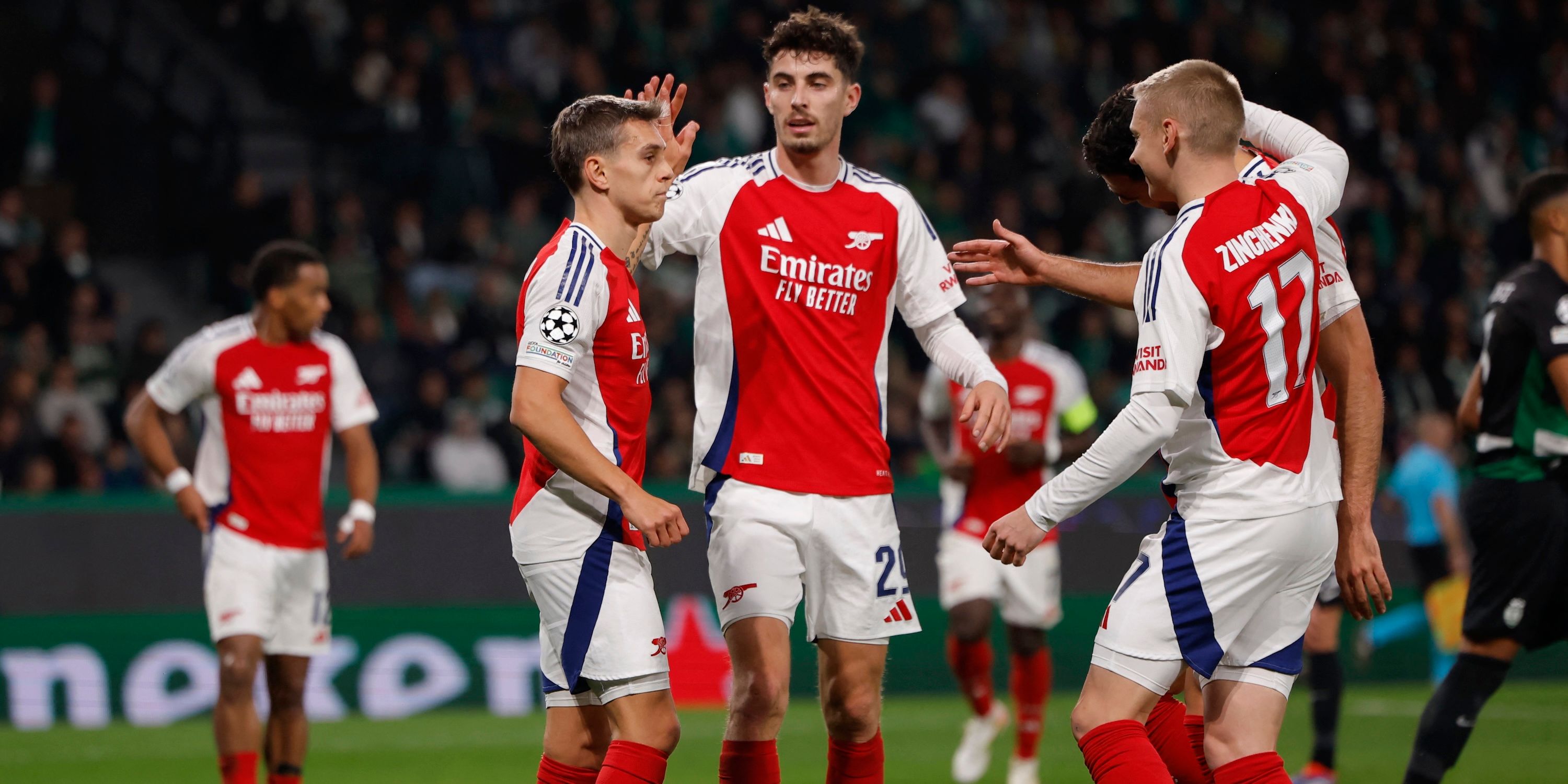 Arsenal's Leandro Trossard celebrates scoring their fifth goal with Kai Havertz and Oleksandr Zinchenko