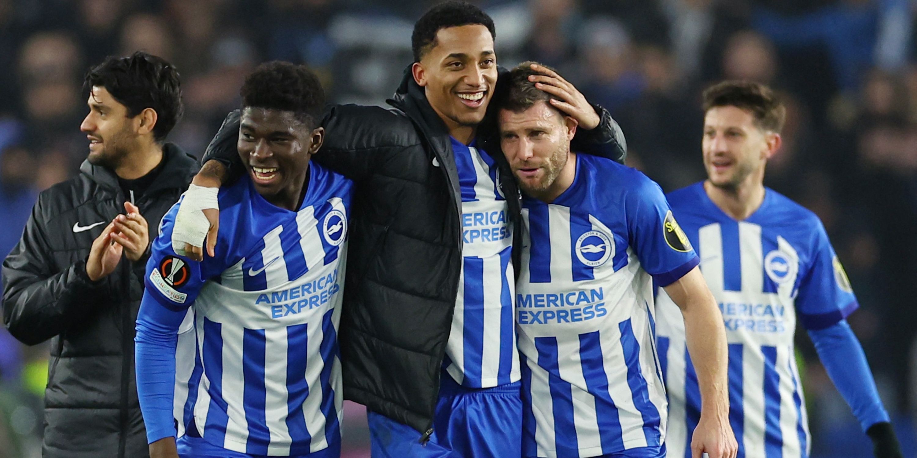 Brighton & Hove Albion players James Milner, Joao Pedro and Carlos Paleba celebrate