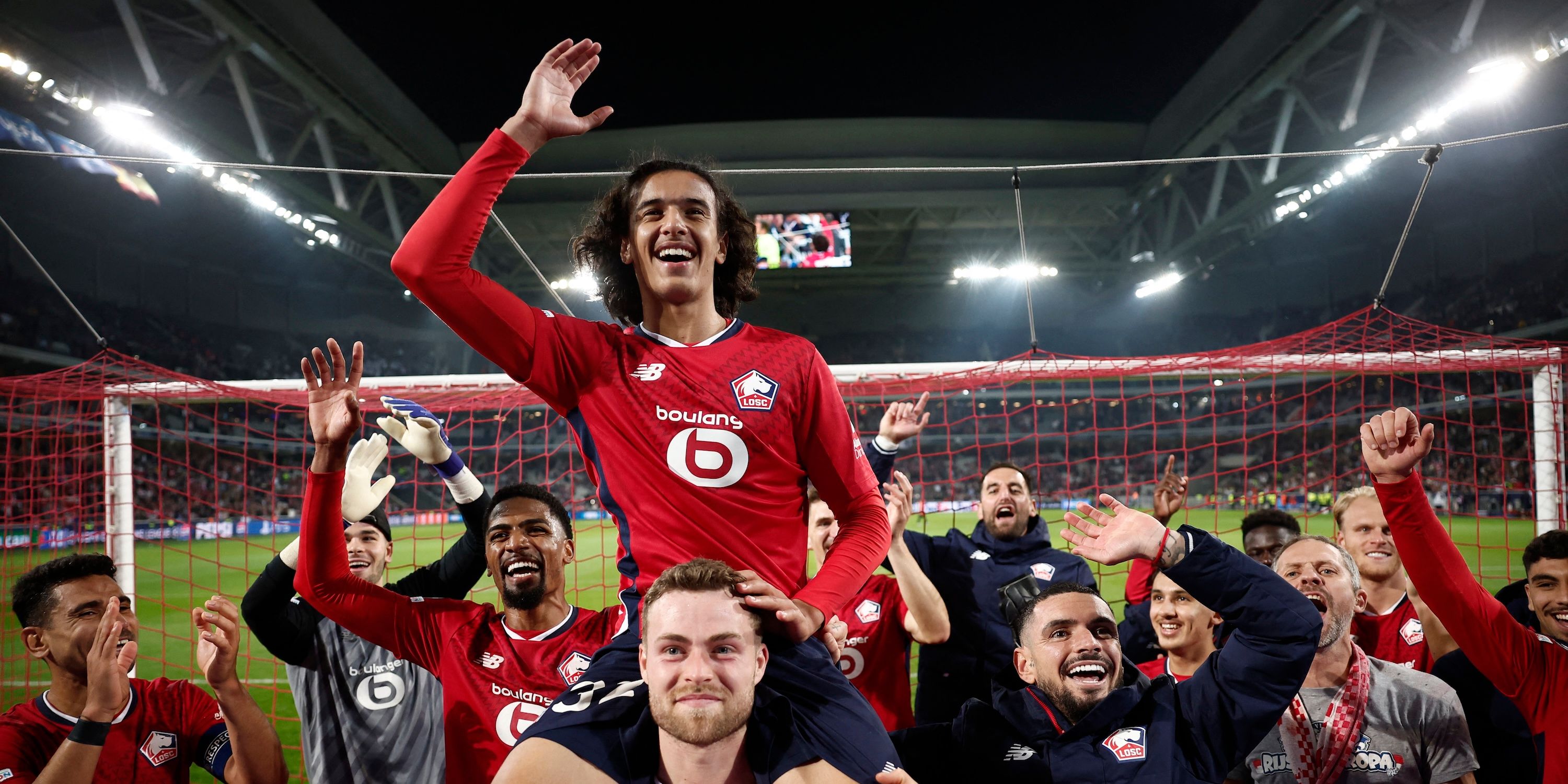 Lille Ayoub Bawadi player celebrates with his teammates after the match