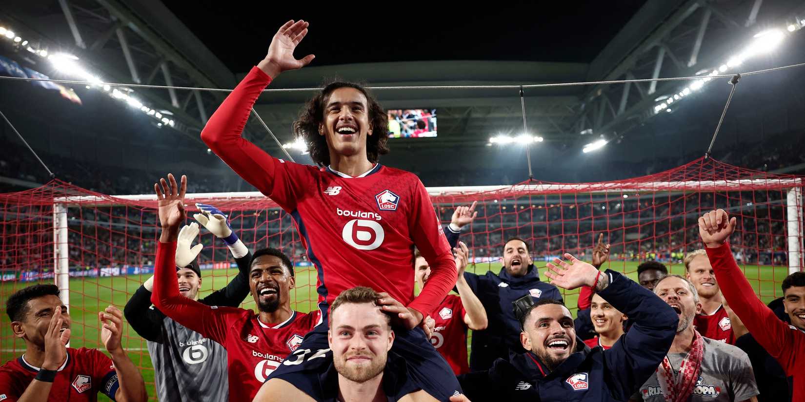 Lille's Ayyoub Bouaddi celebrates with teammates after the match