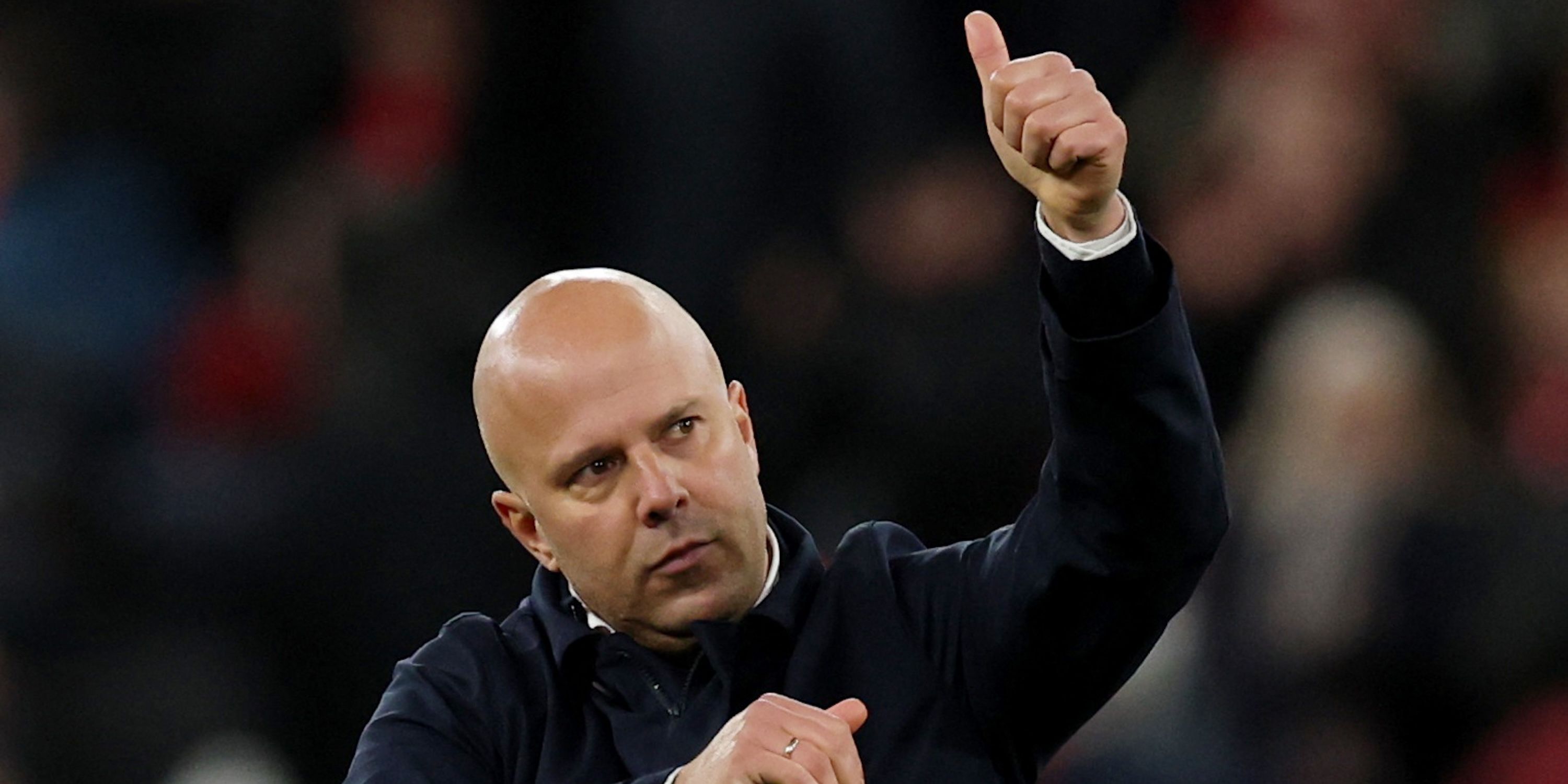 Liverpool coach Arne Slott celebrates after the match