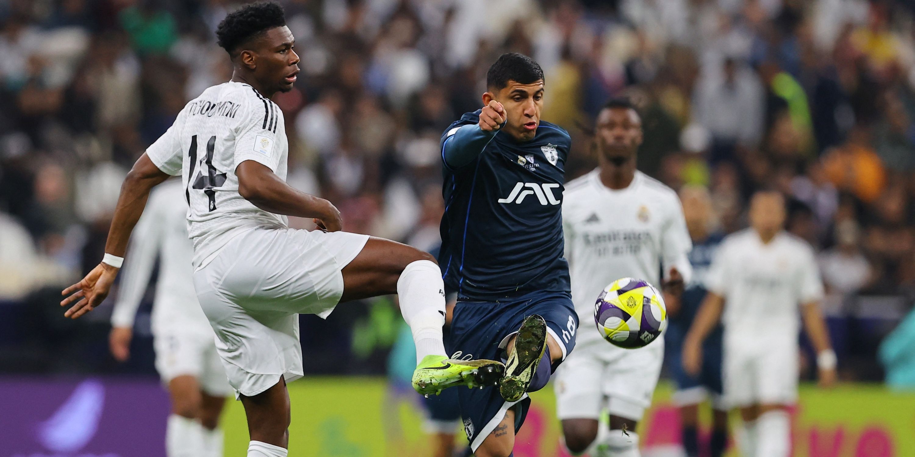 Real Madrid's Aurelien Tchouameni in action with Pachuca's Bryan Gonzalez