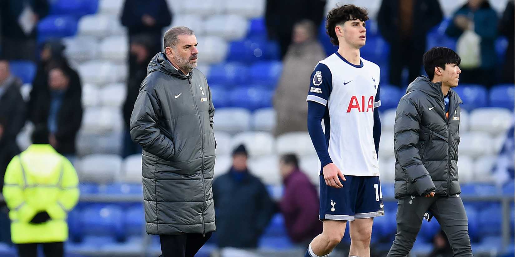 Ange Postecoglou and Archie Gray look dejected
