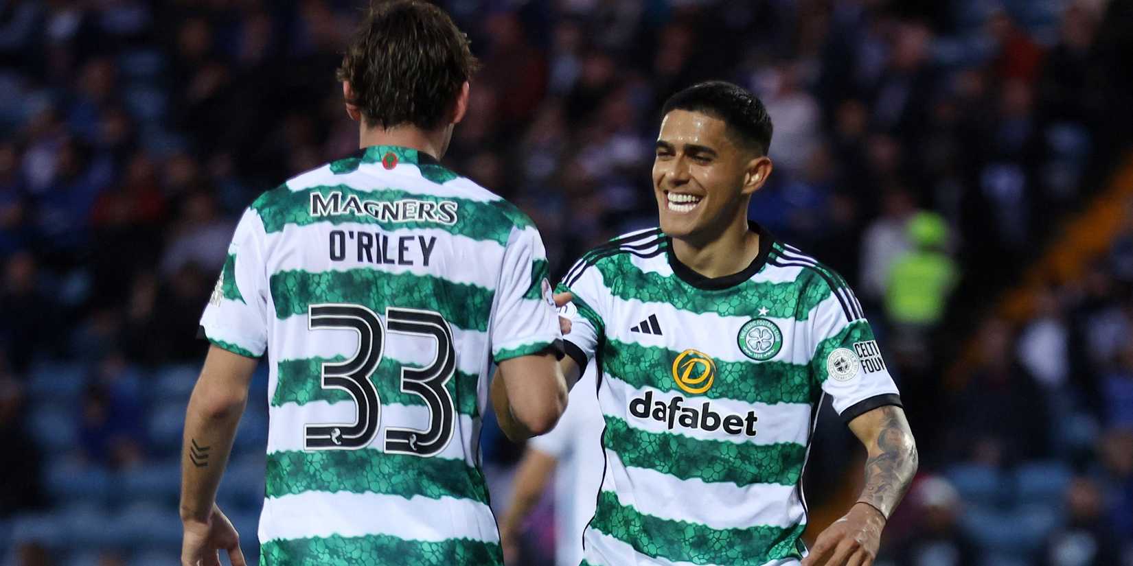 Celtic's Matt O'Riley celebrates scoring their fourth goal with Luis Palma