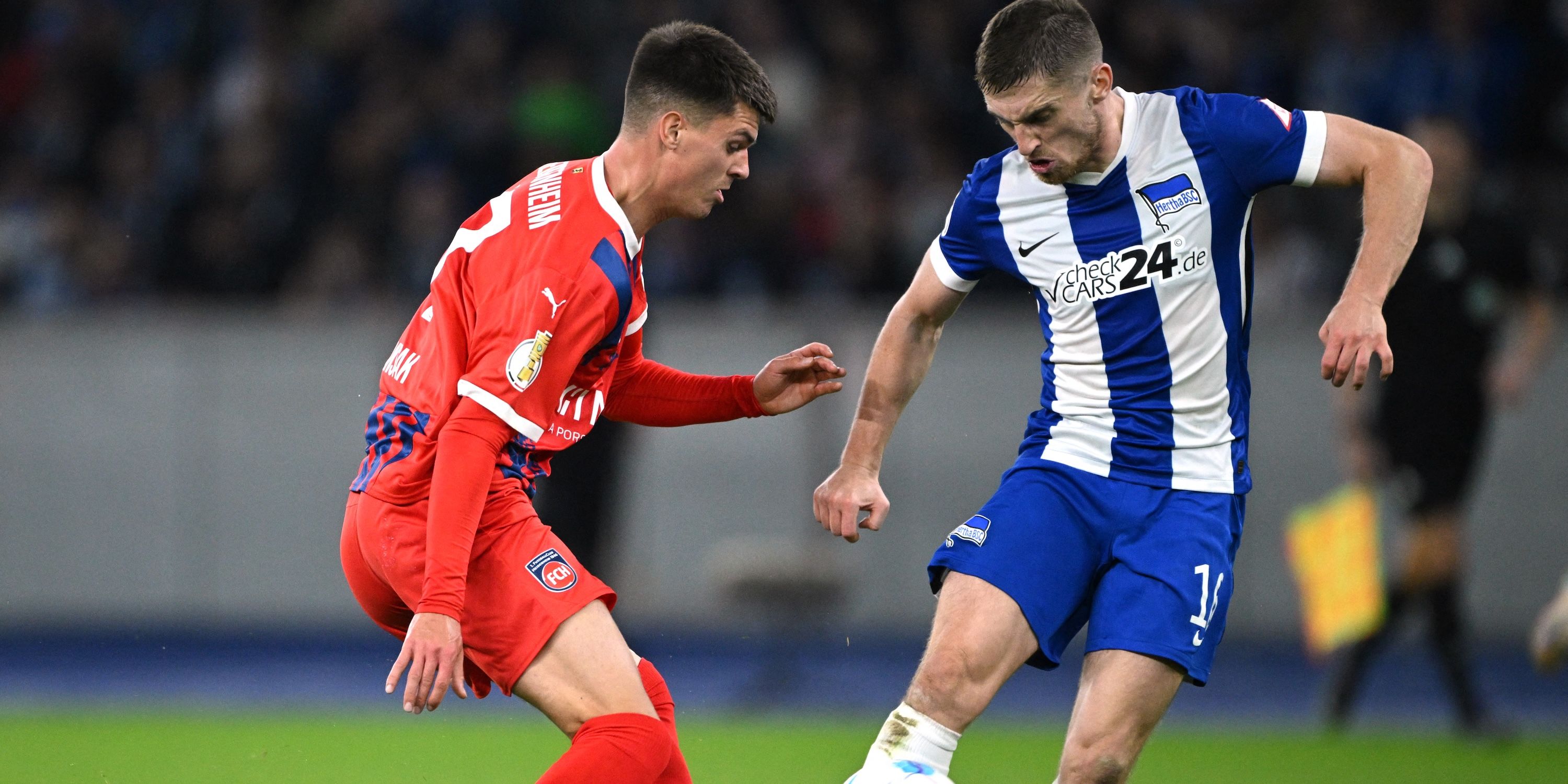 Heidenheim's Matthias Hunsacker in action against Hertha Berlin's Jonjo Kenny 